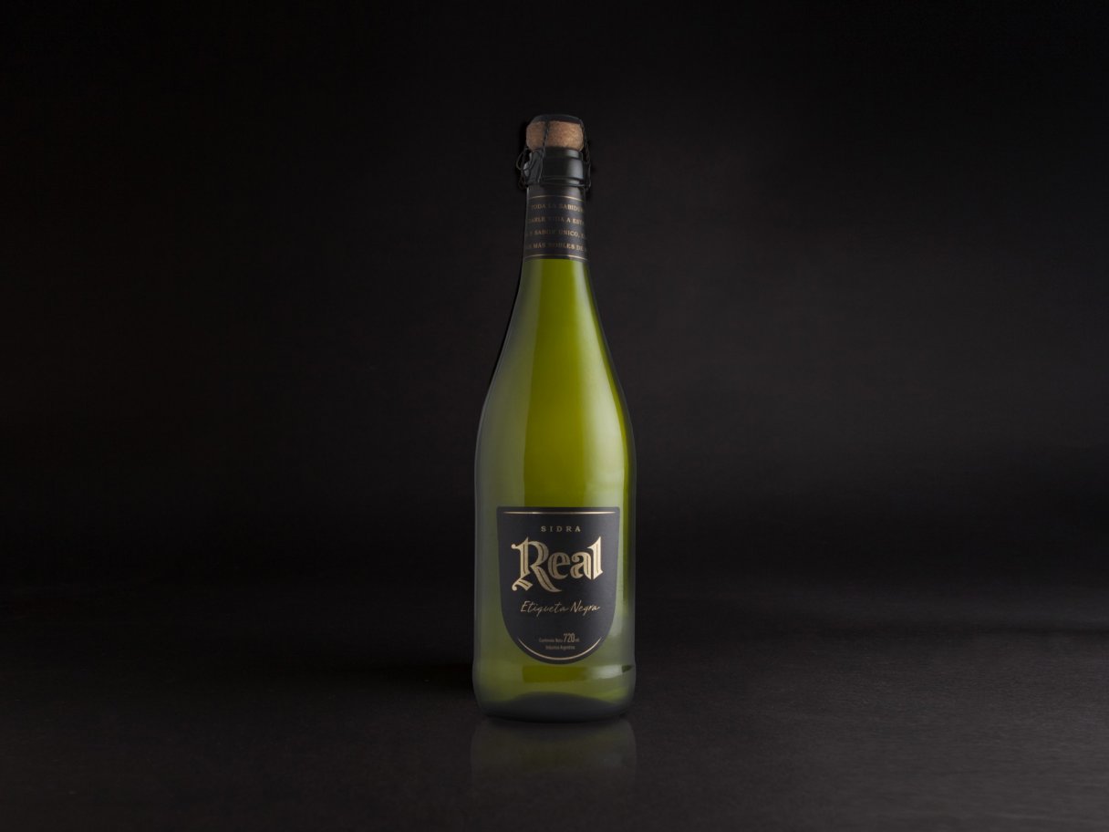 Rooftops of a coastal town with the sea in background