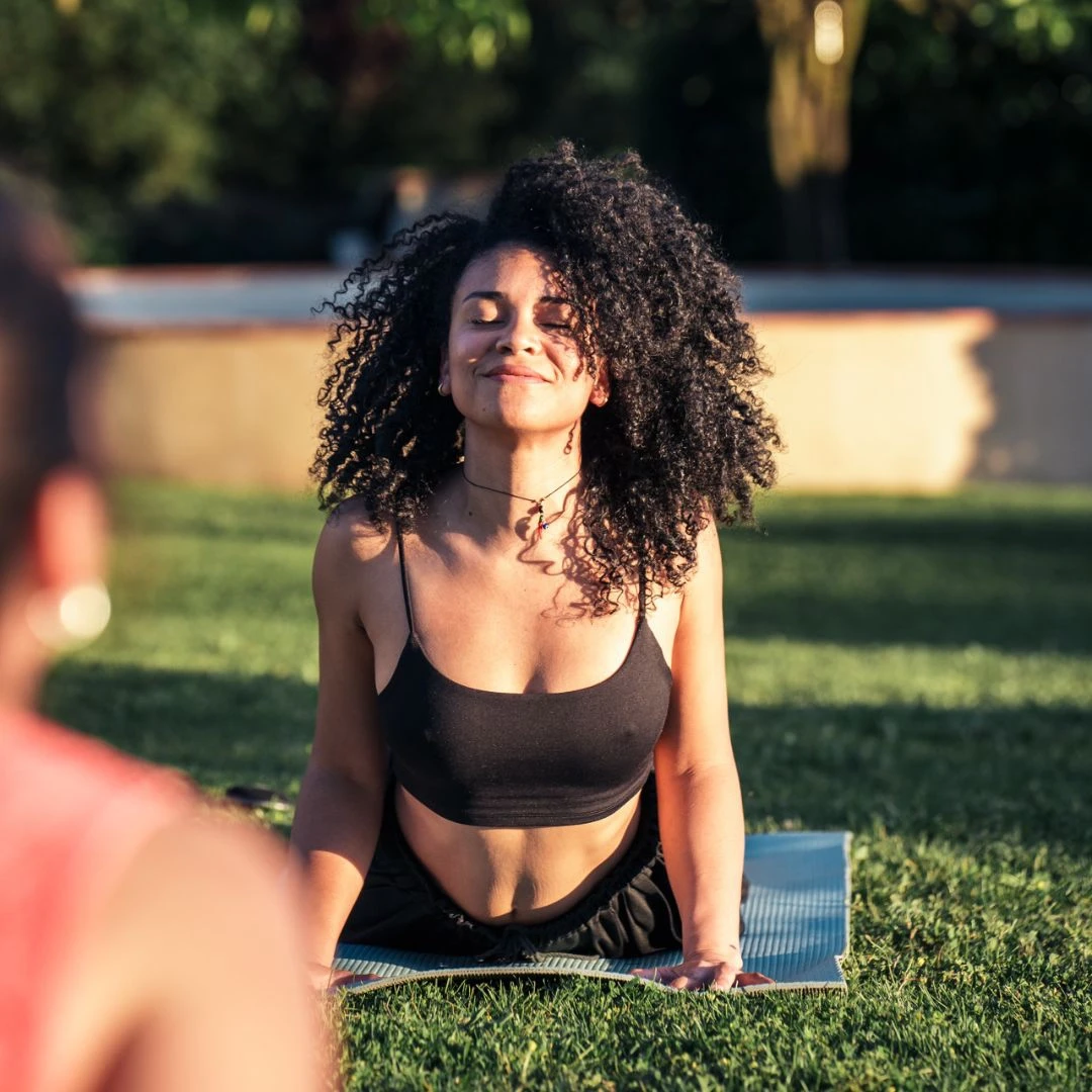 Duby practising yoga in the parc