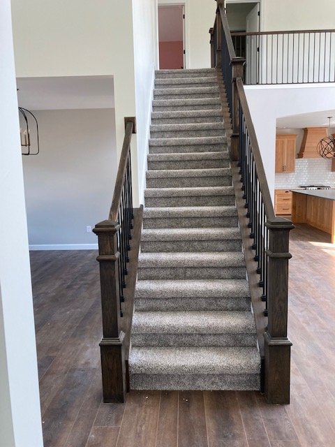 Freshly installed carpet on stairs by Shilling's Carpets & Floors