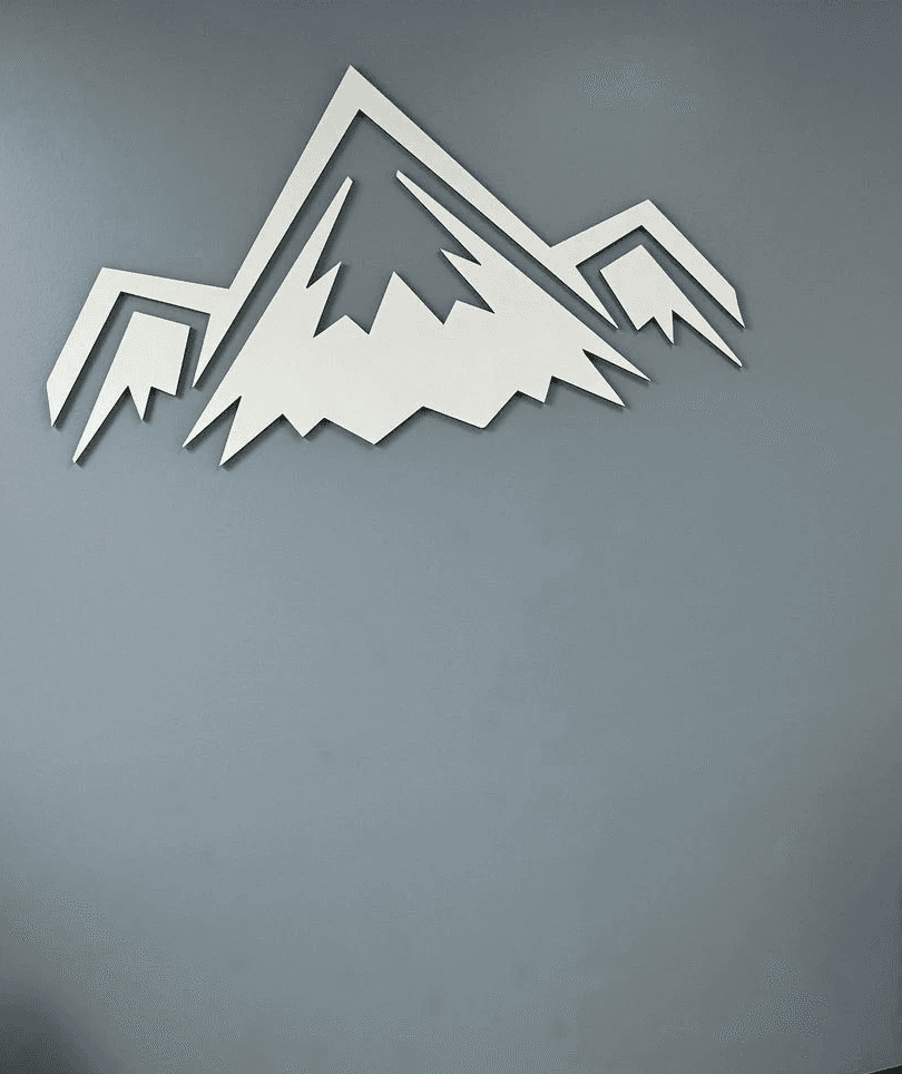 RMR chair with elevate performance labs logo on the wall