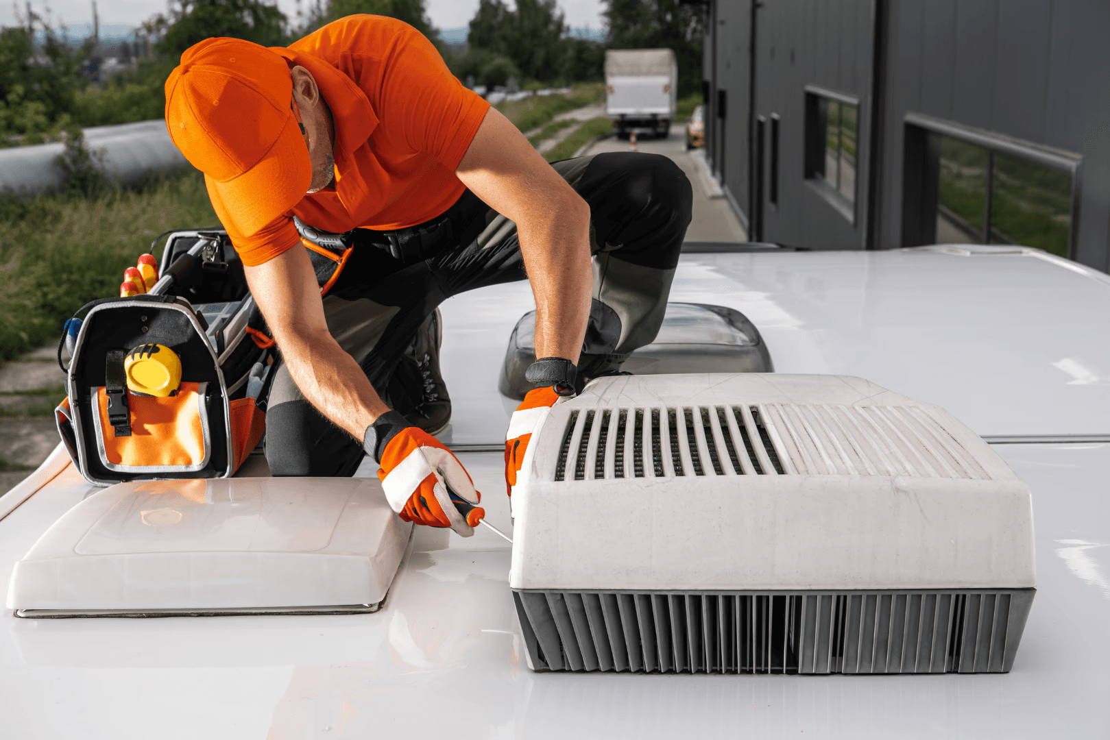 Technician  fixes HVAC system