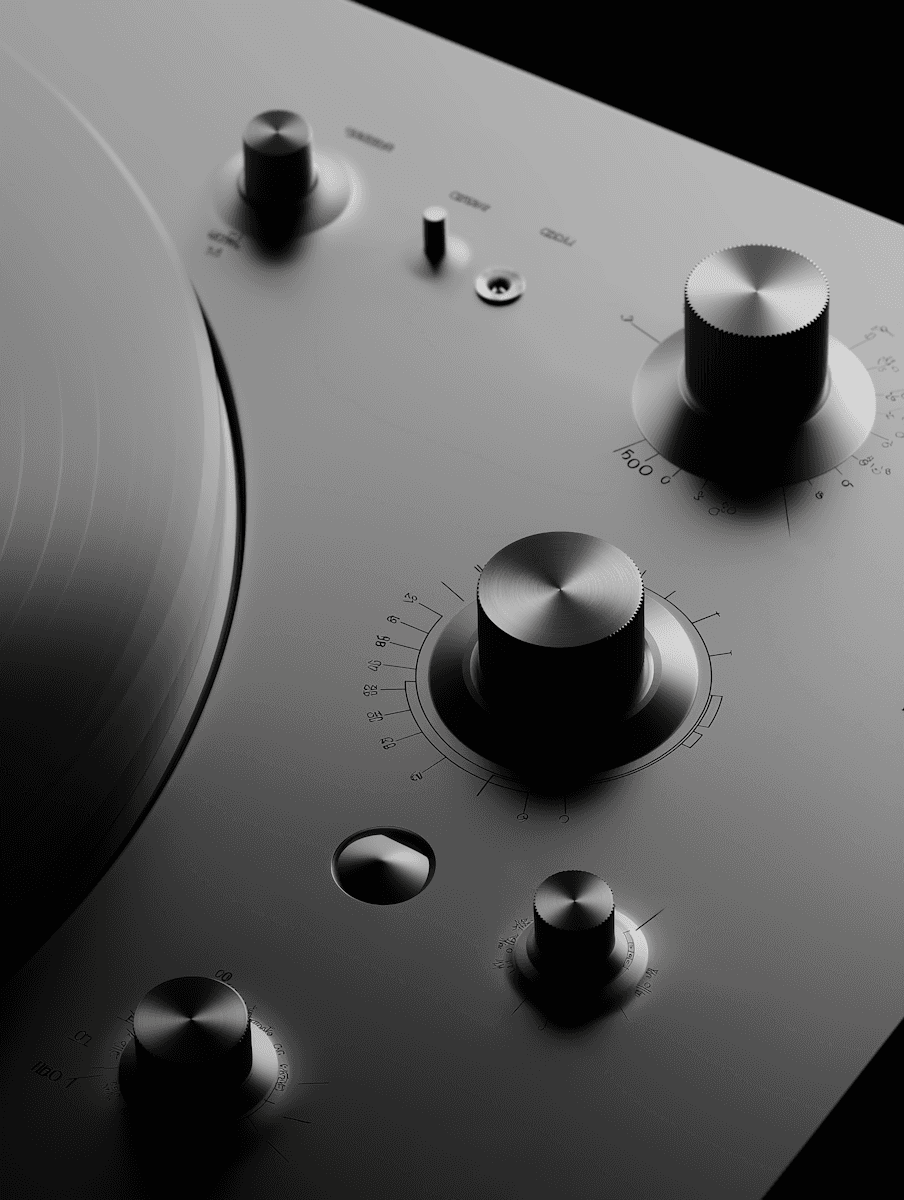 Close-up of a modern audio device with metallic knobs and dials, showcasing a sleek and minimalistic design with precise details.