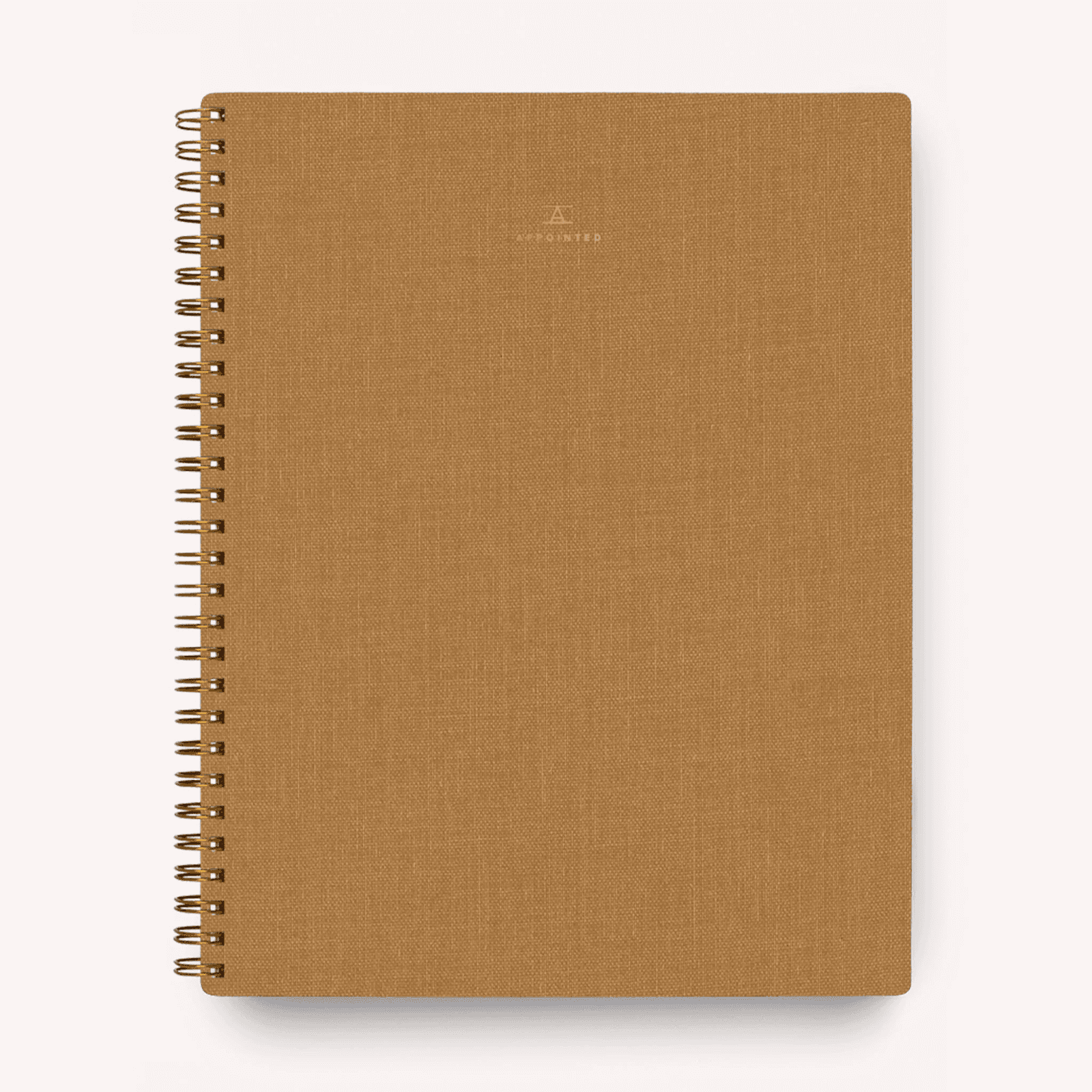 photo of a teak colored notebook