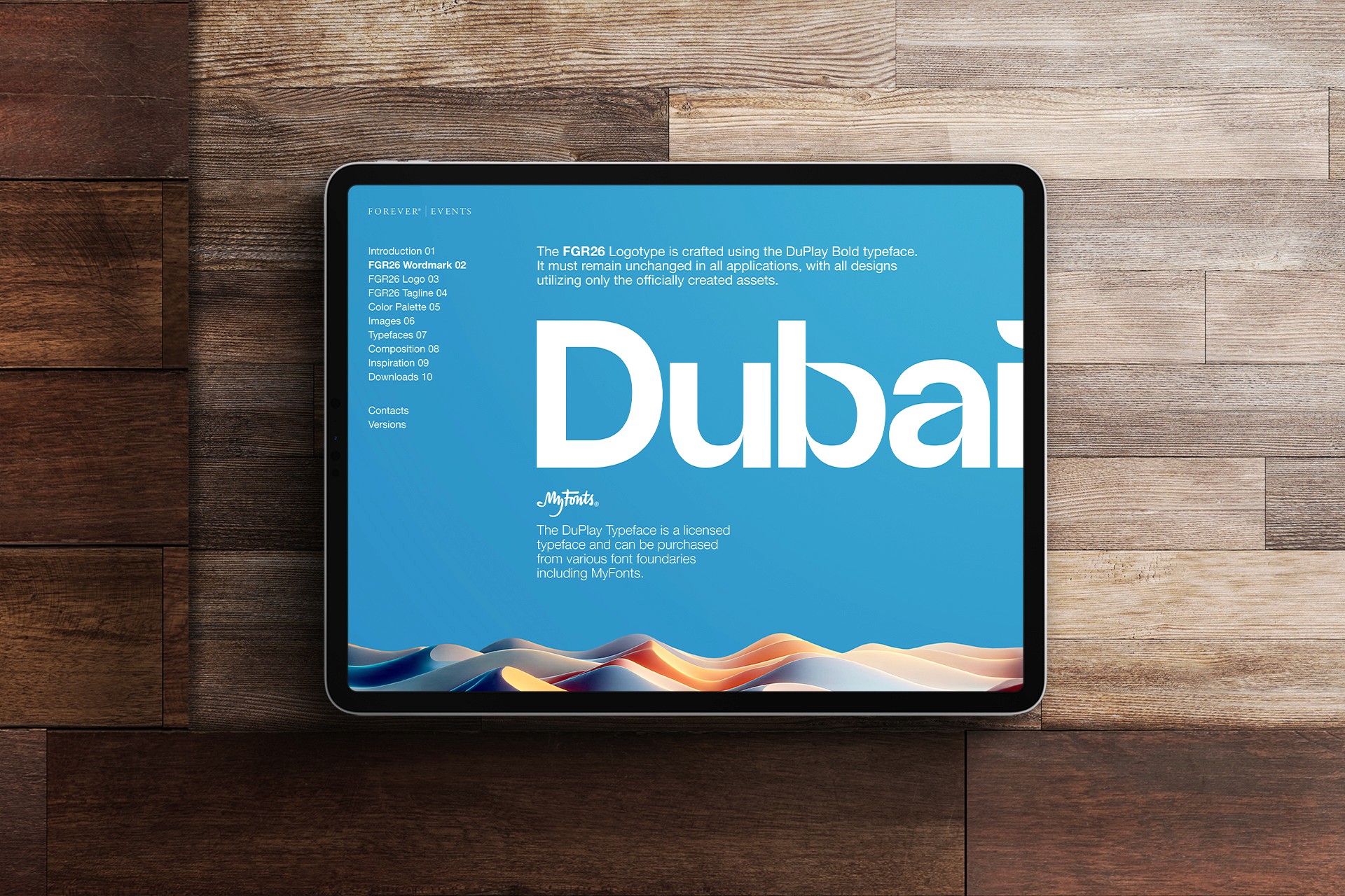 Event style guide set on an iPad on a wooden background