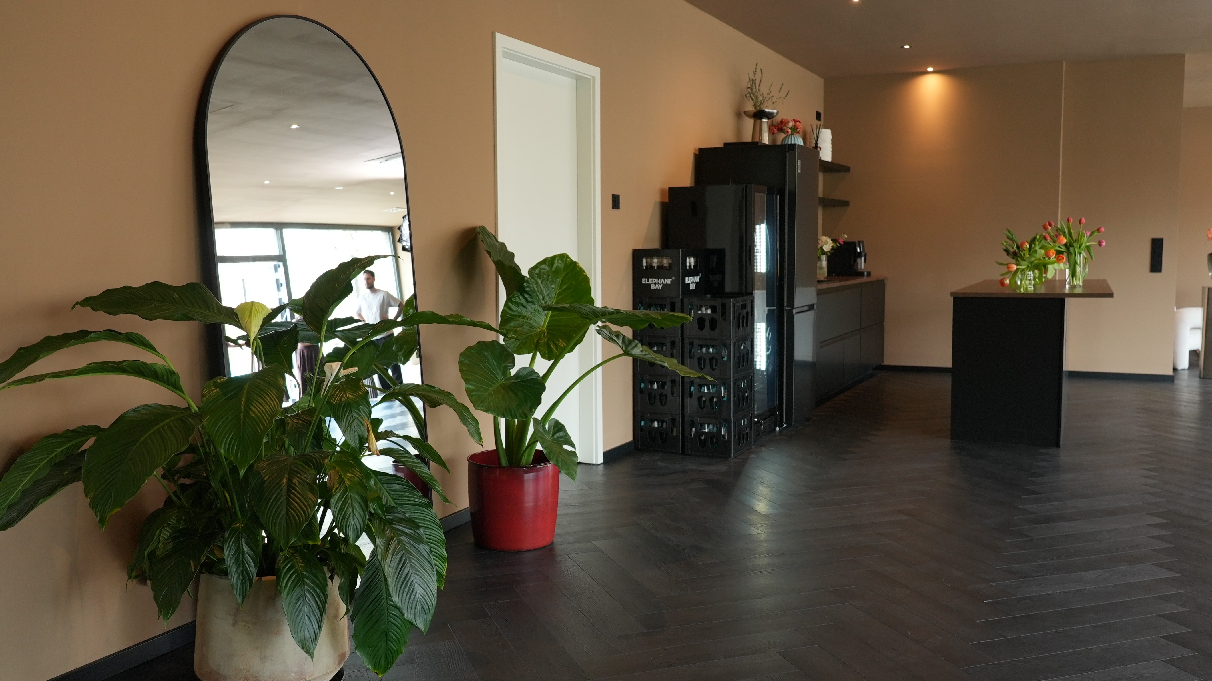 Abstract geometric pattern of building balconies against bright sky
