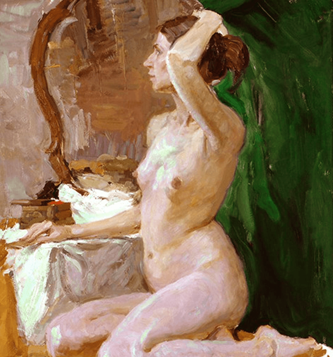 Young woman in colorful robe reads a book.