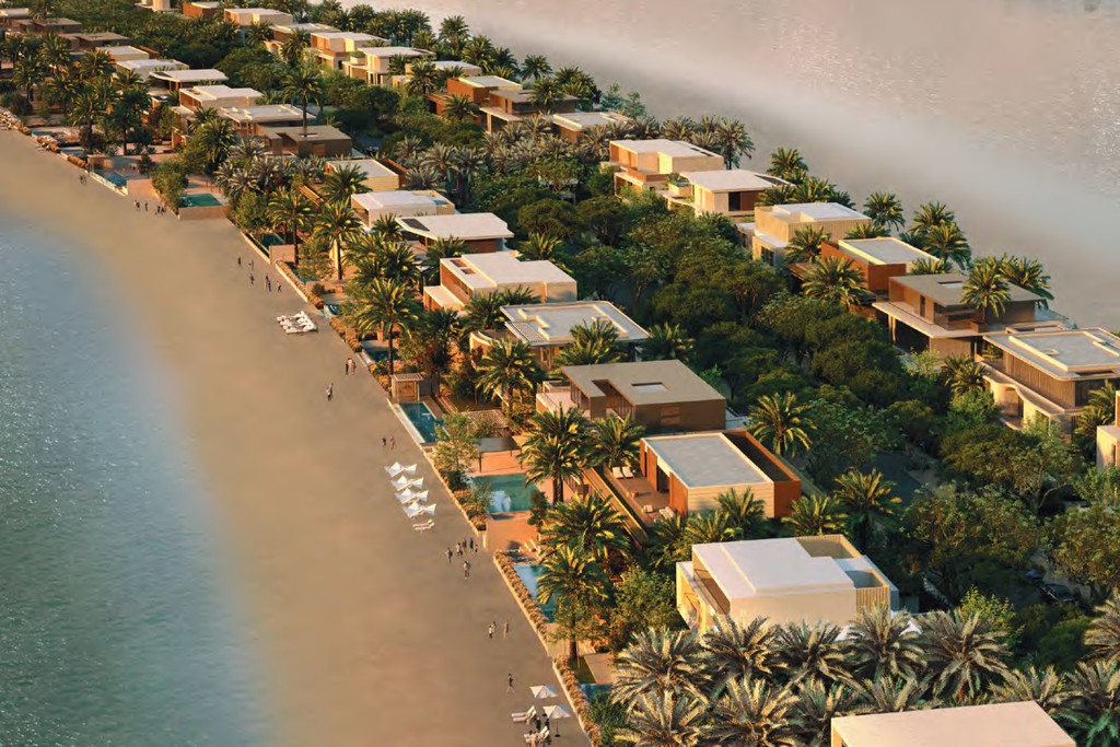 Scenic view of Palm Jebel Ali beach, featuring golden sands and clear blue waters under a bright sky.
