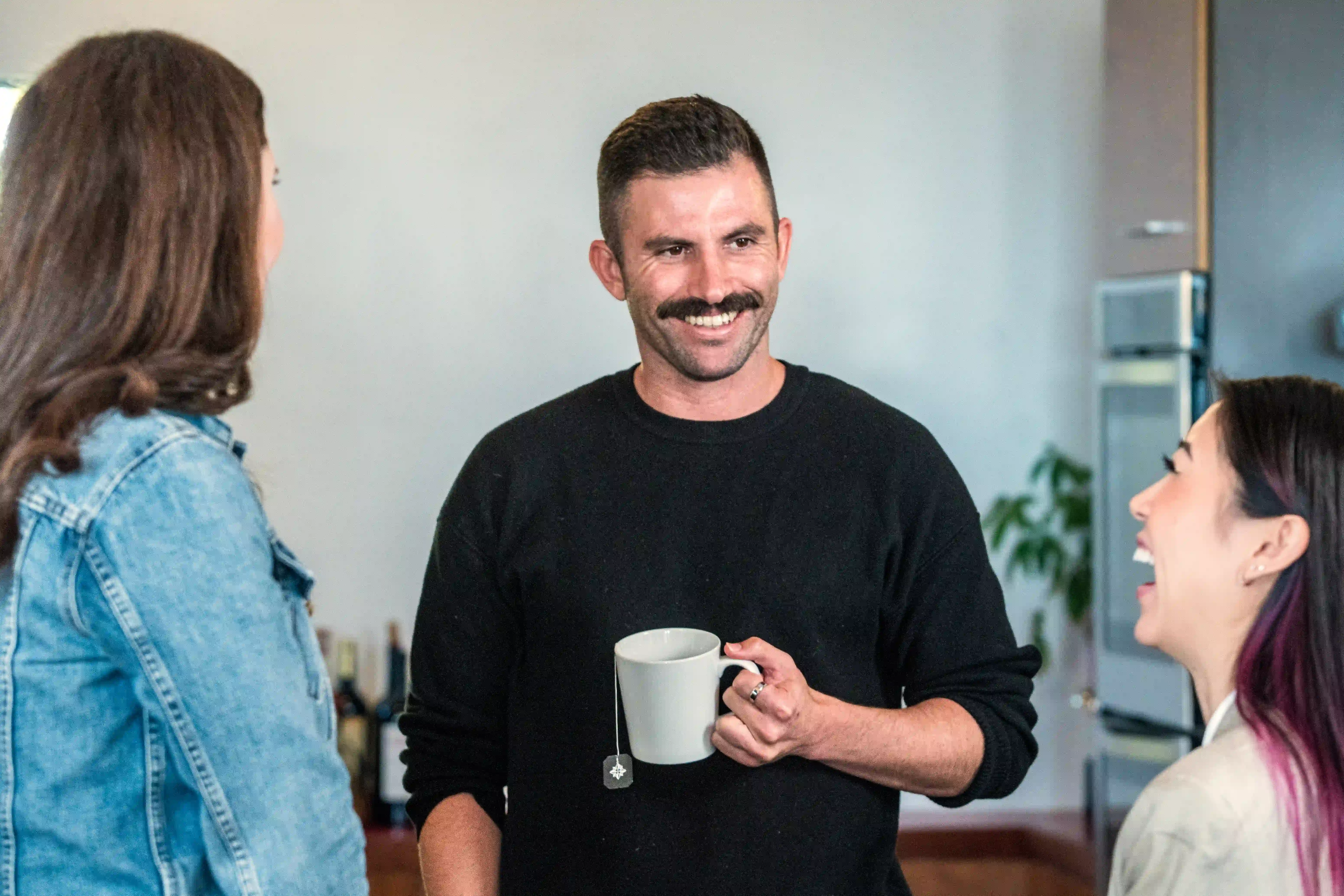 Therapist talking with a client during a gender exploration therapy session in Los Angeles, offering affirming and supportive care for identity and transition.