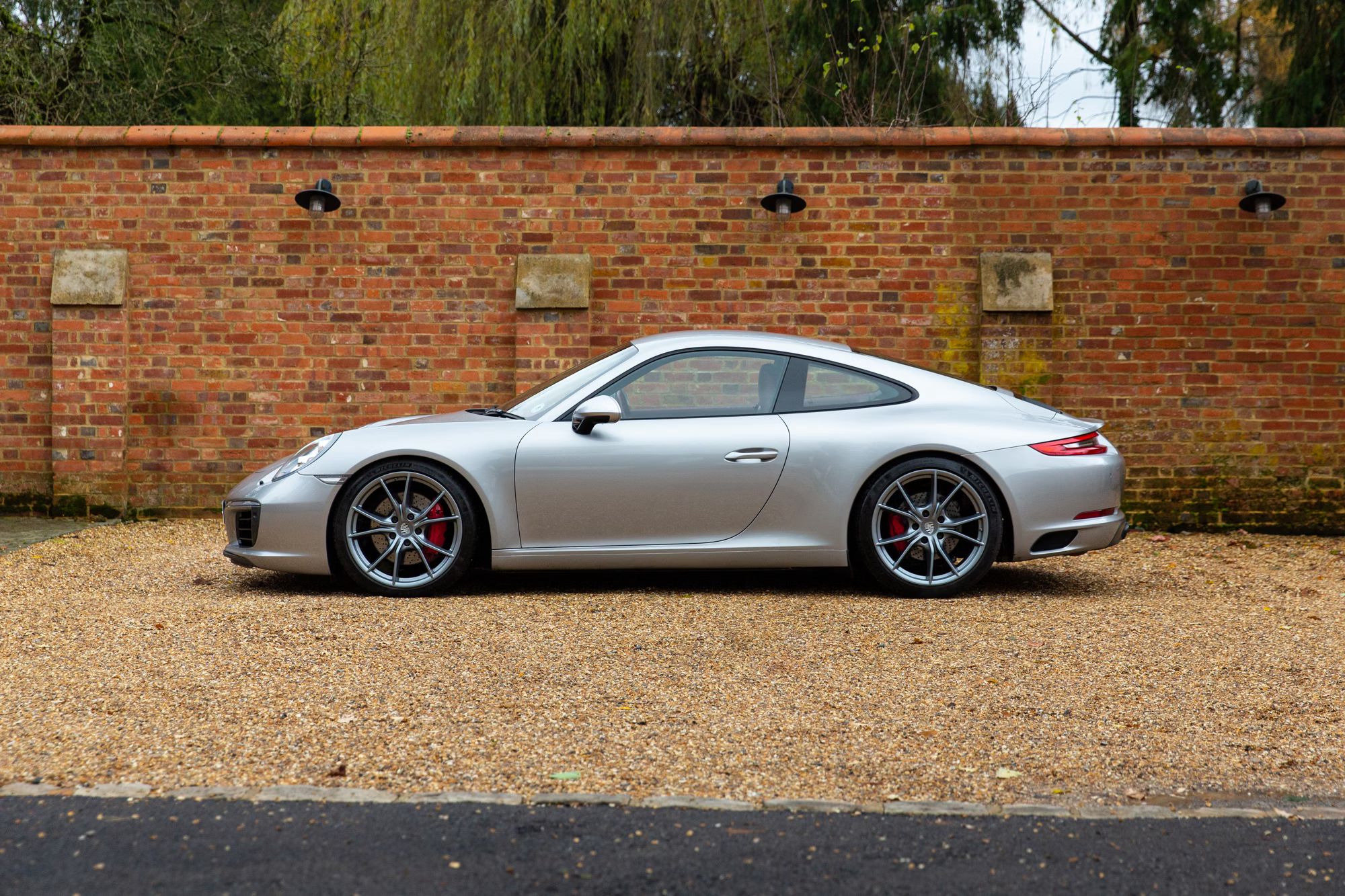 silver porsche left side