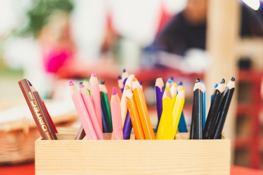 assorted-color color pencils in a classroom