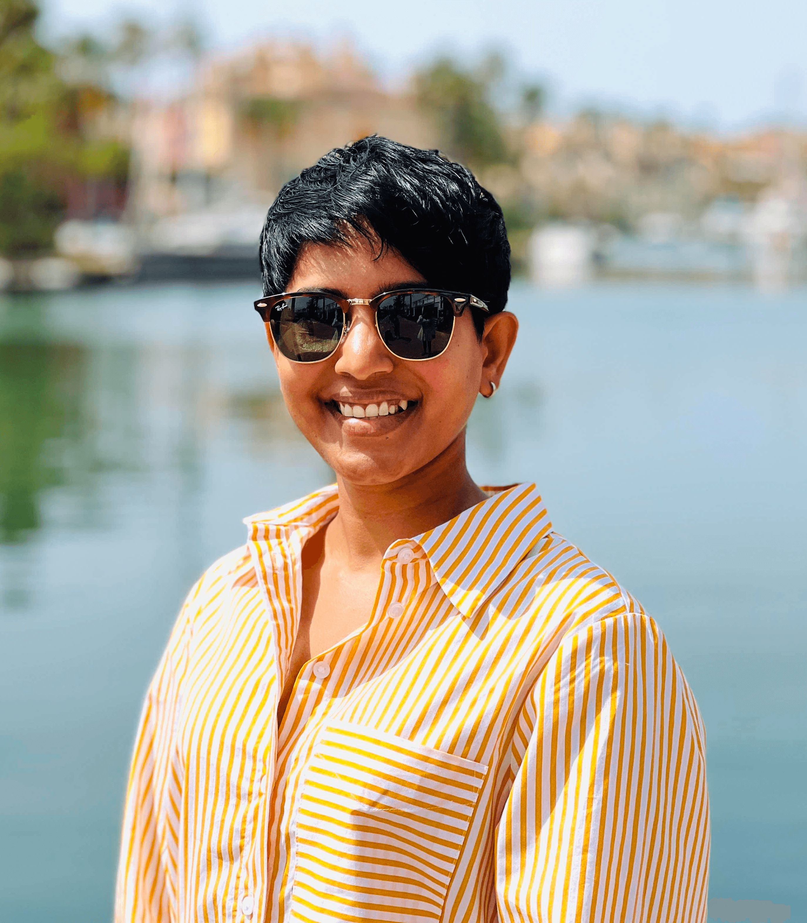 man in black jacket and brown cap