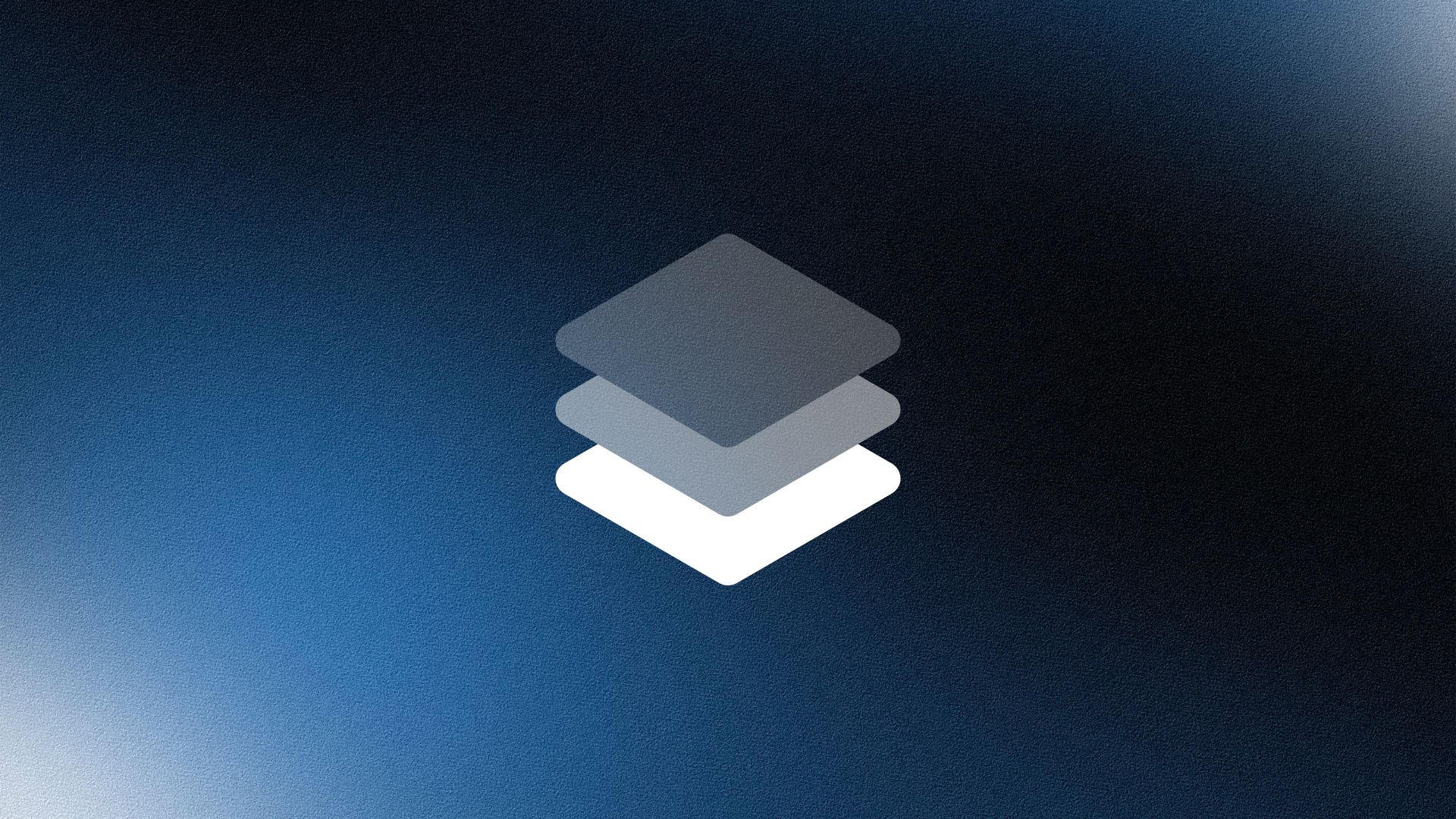 Man wearing a beige cap and dark shirt working on a laptop at a wooden desk with a plant in the background.