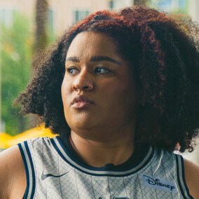 Possible member looking at the camera.