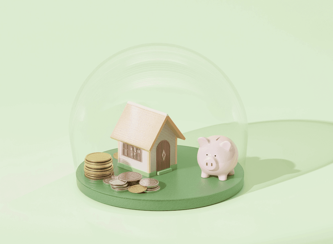 Two men discuss a project while standing at a laptop in an office.