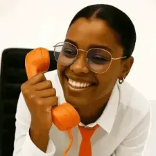 Admin lady answering a phone at workplace