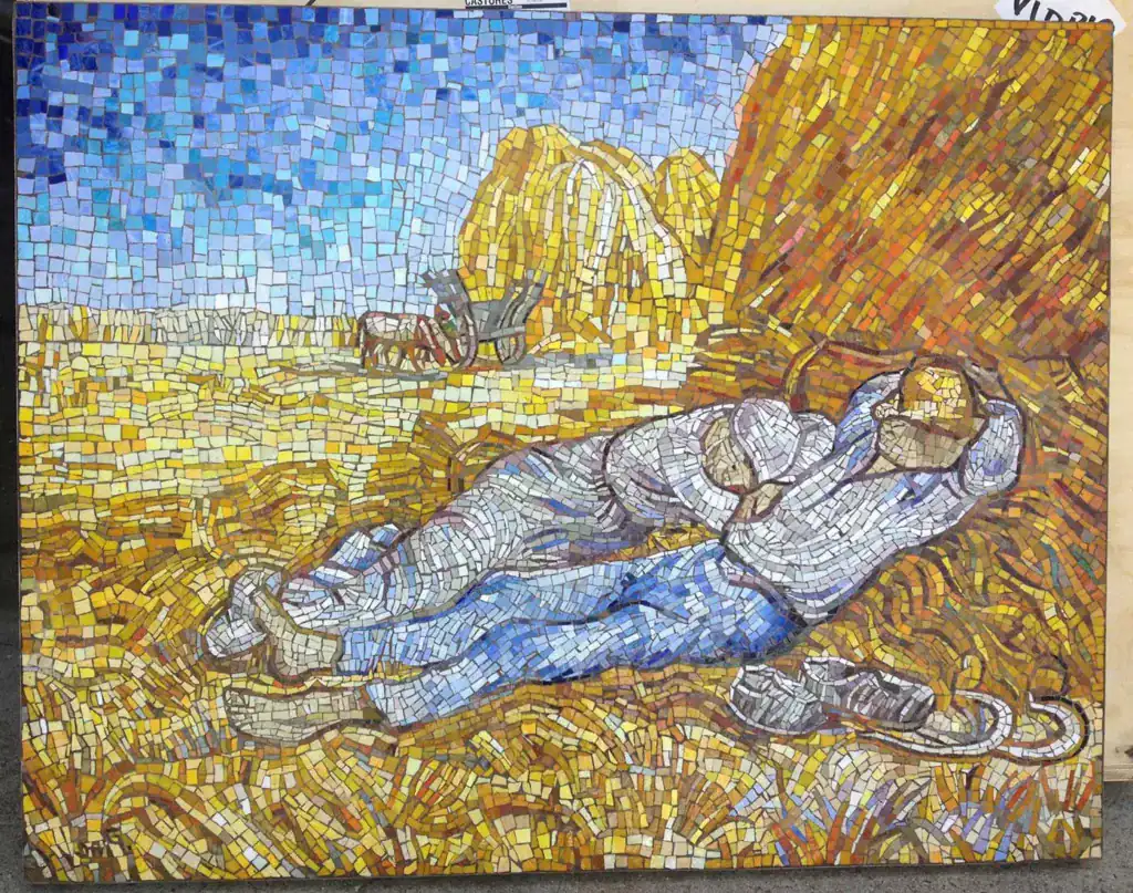 Mosaic wall art inspired by Van Gogh's "Afternoon Rest" featuring a couple relaxing in a wheat field.