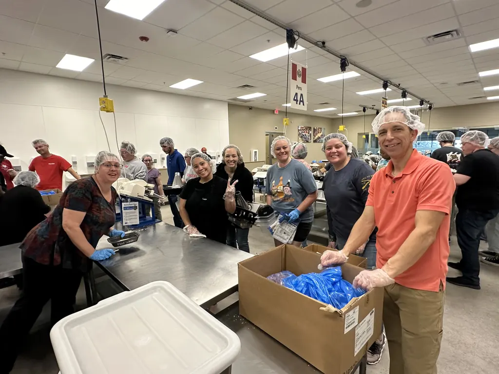 Dr. Gailey and the team at Gateway Family Dentistry serving the community at Feed My Starving Children.