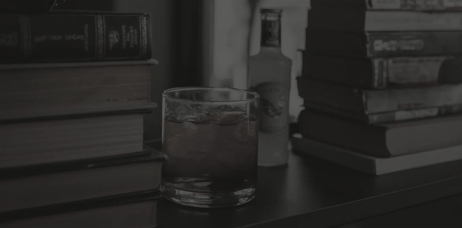 Two chefs behind the kitchen counter