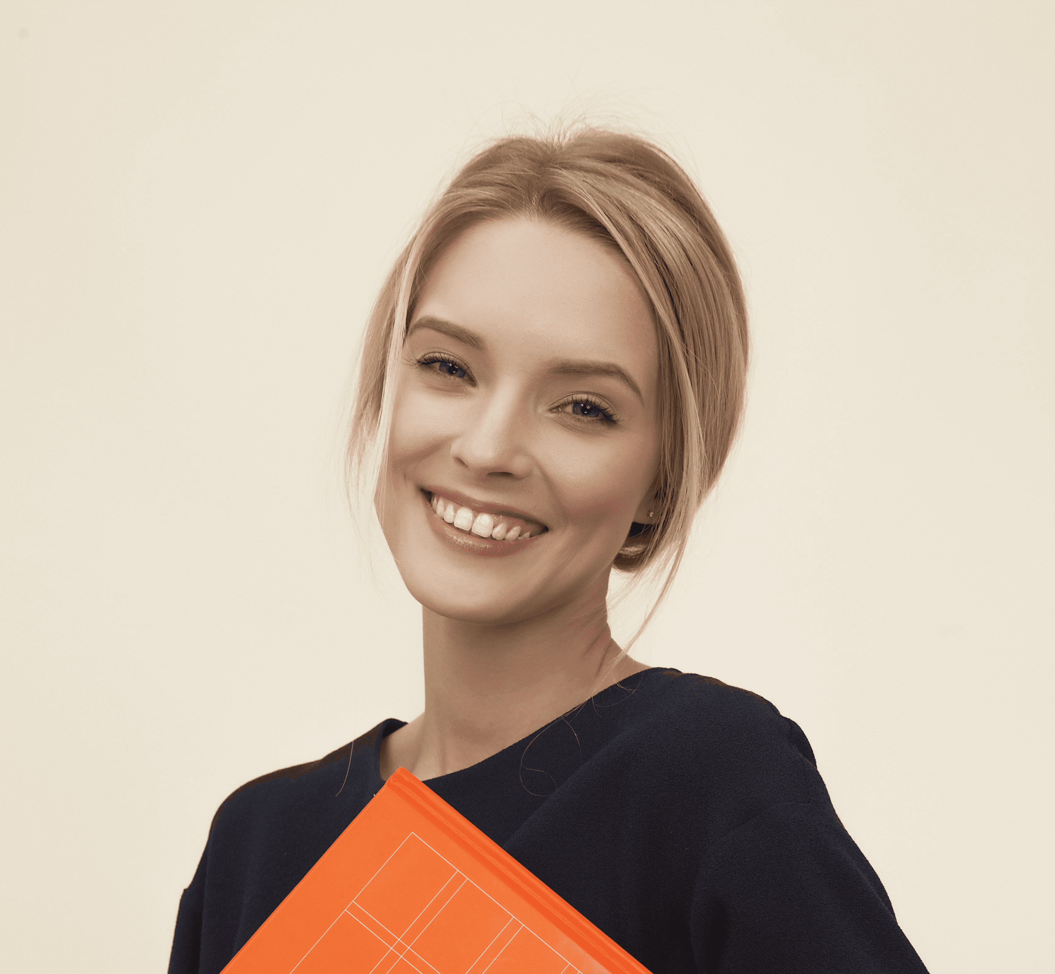 smiling woman standing while holding orange folder