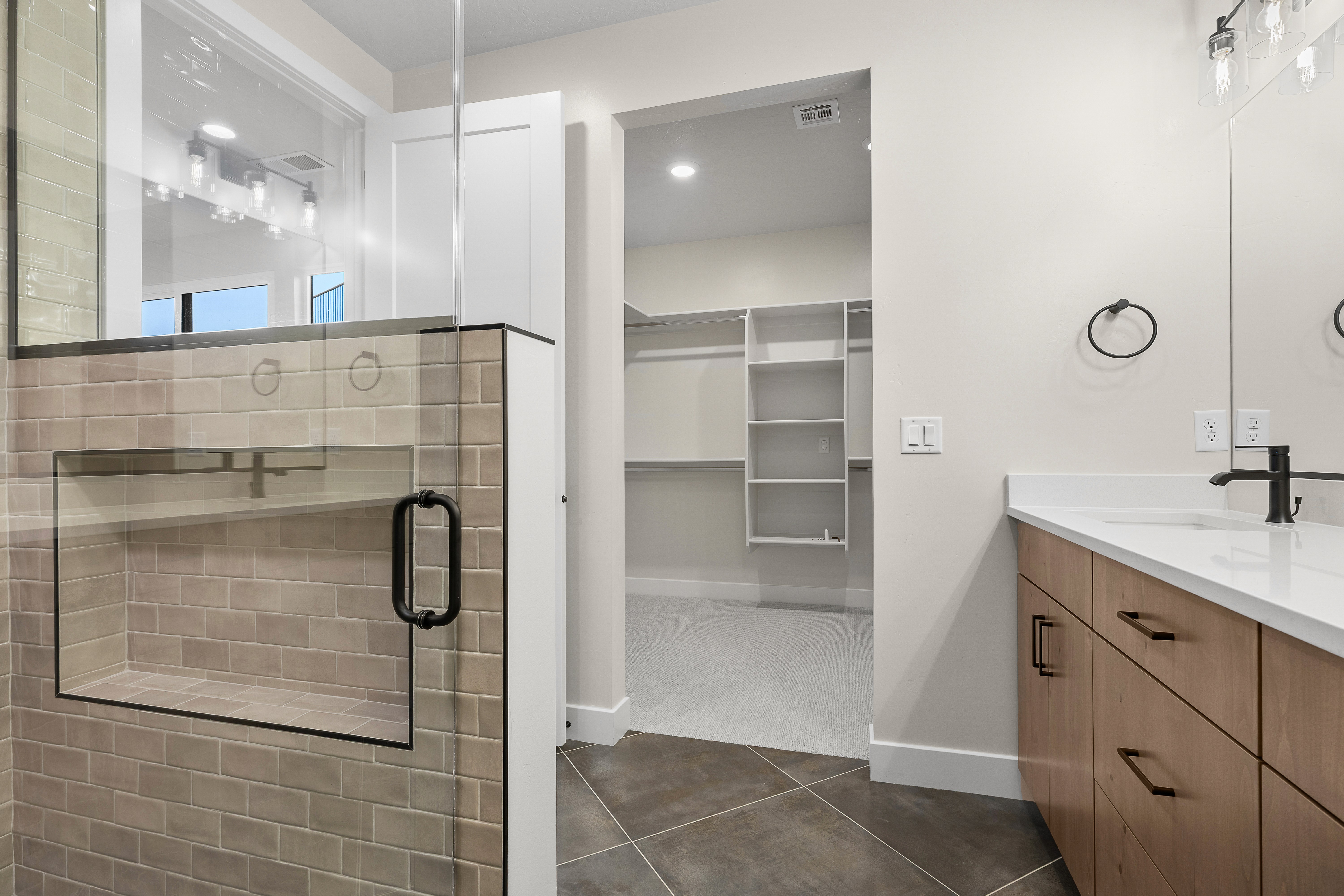 Custom primary bath in a Southern Utah home with clean design and natural light