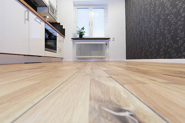 Kitchen and dining area with wooden flooring