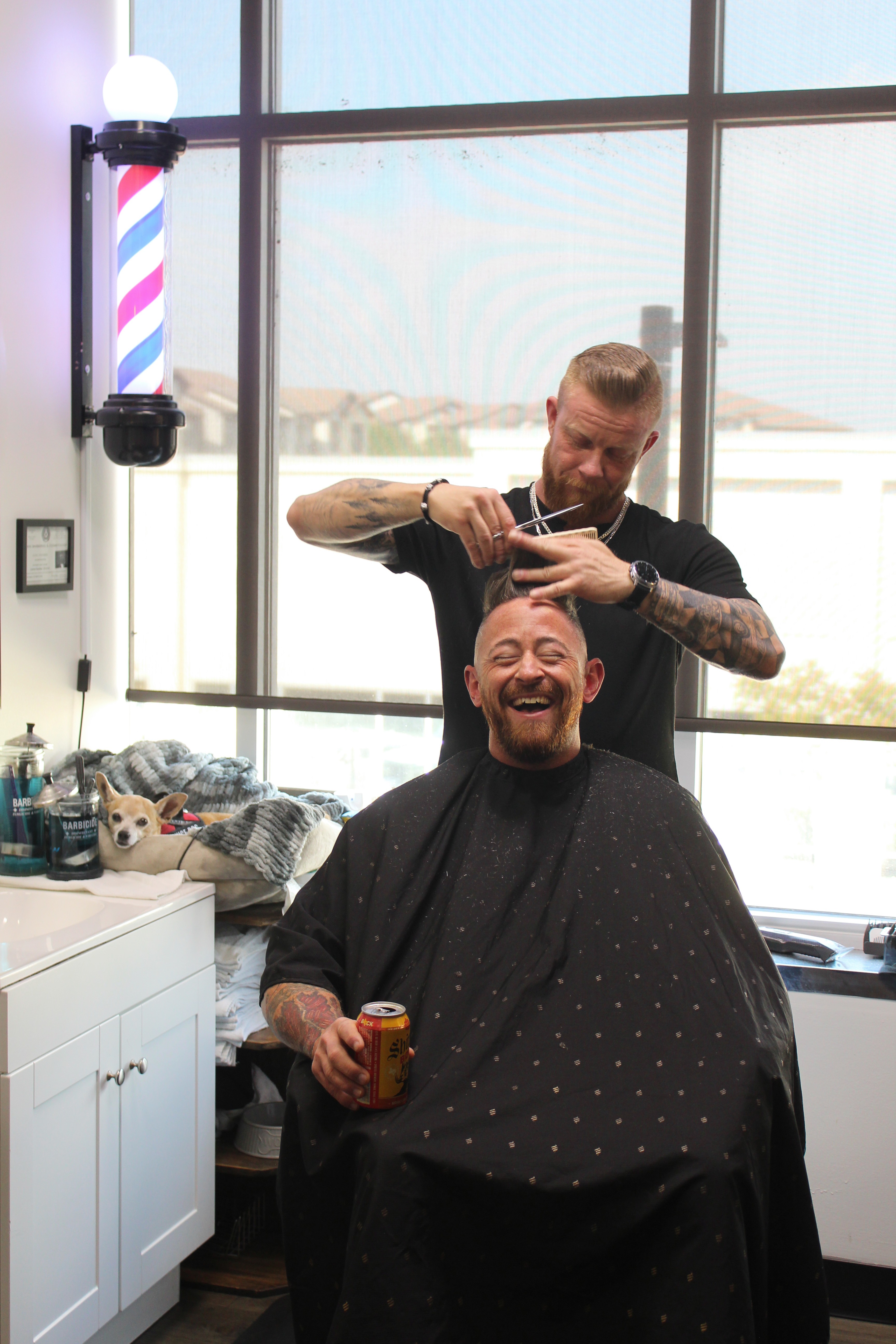 Master barber Matt Finner giving a precision men’s haircut at Minnesota Matt’s Barbershop in Euless, TX. Client relaxes in the chair during an appointment‑only grooming service.