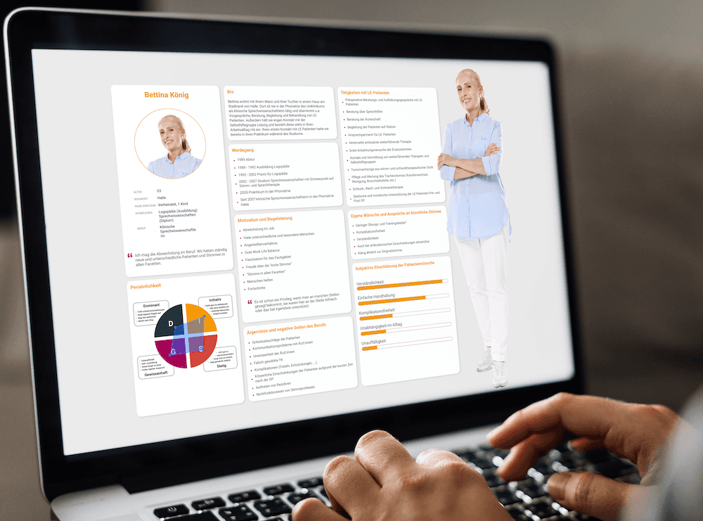 Ein Laptopbildschirm zeigt ein Personamodell mit bunten Statistiken, Diagrammen und Texten