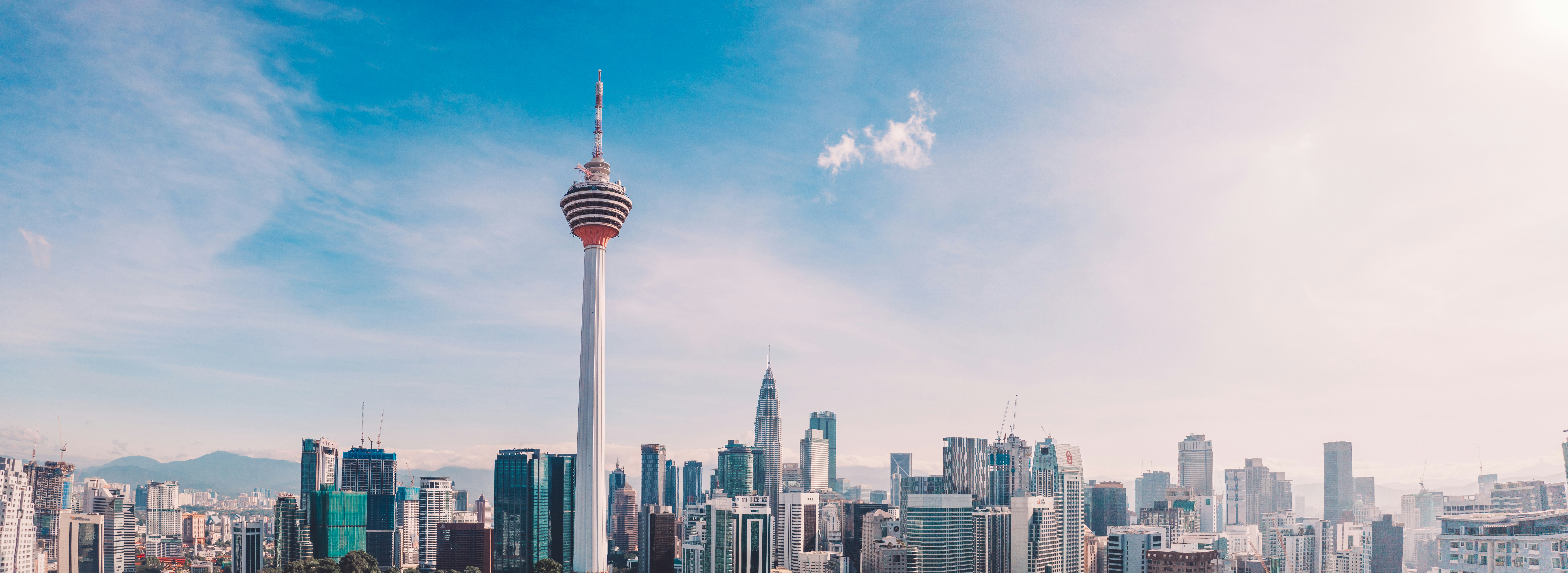 red and white tower under blue sky during daytime