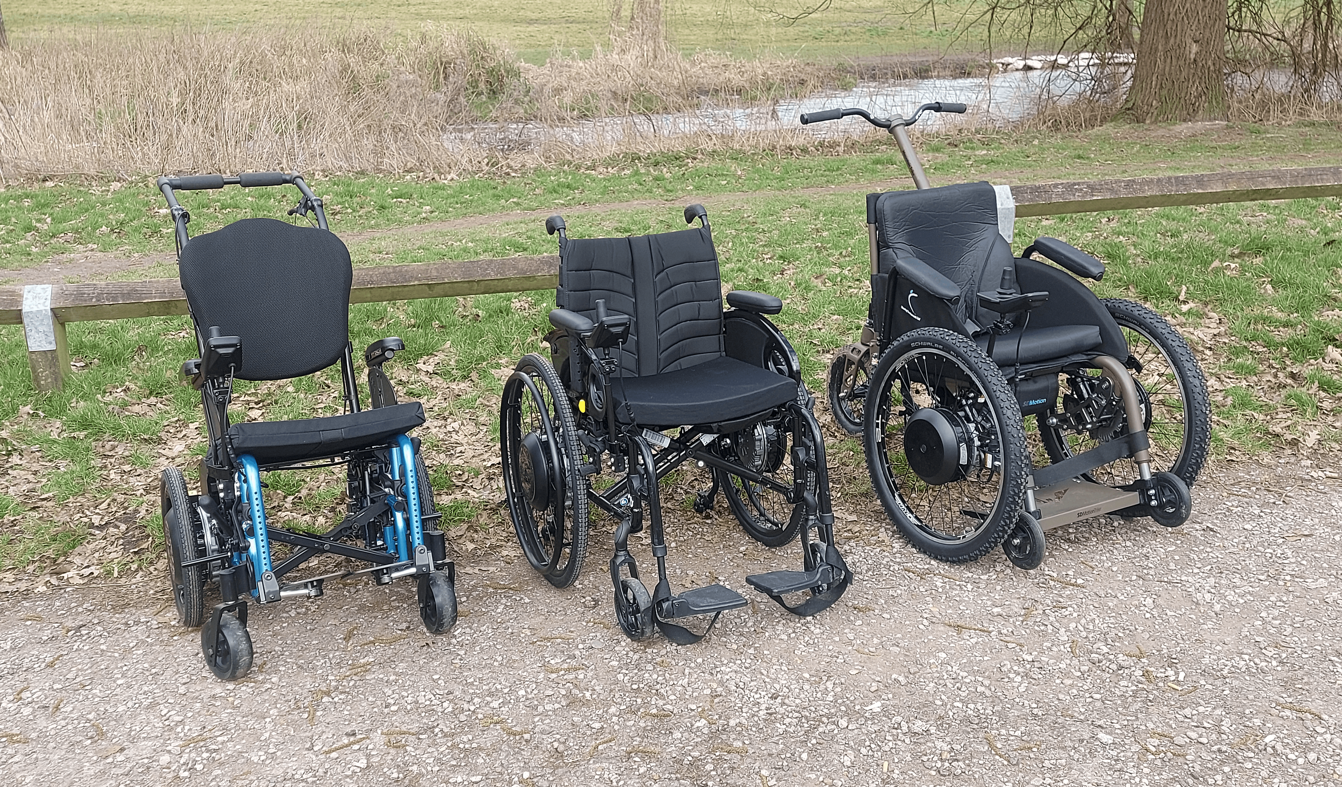 SD Motion range. 16" SD Motion Drive on Little Arc chair, SD Motion Drive on QS 5X wheelchair, and SD Motion Trike, outdoors
