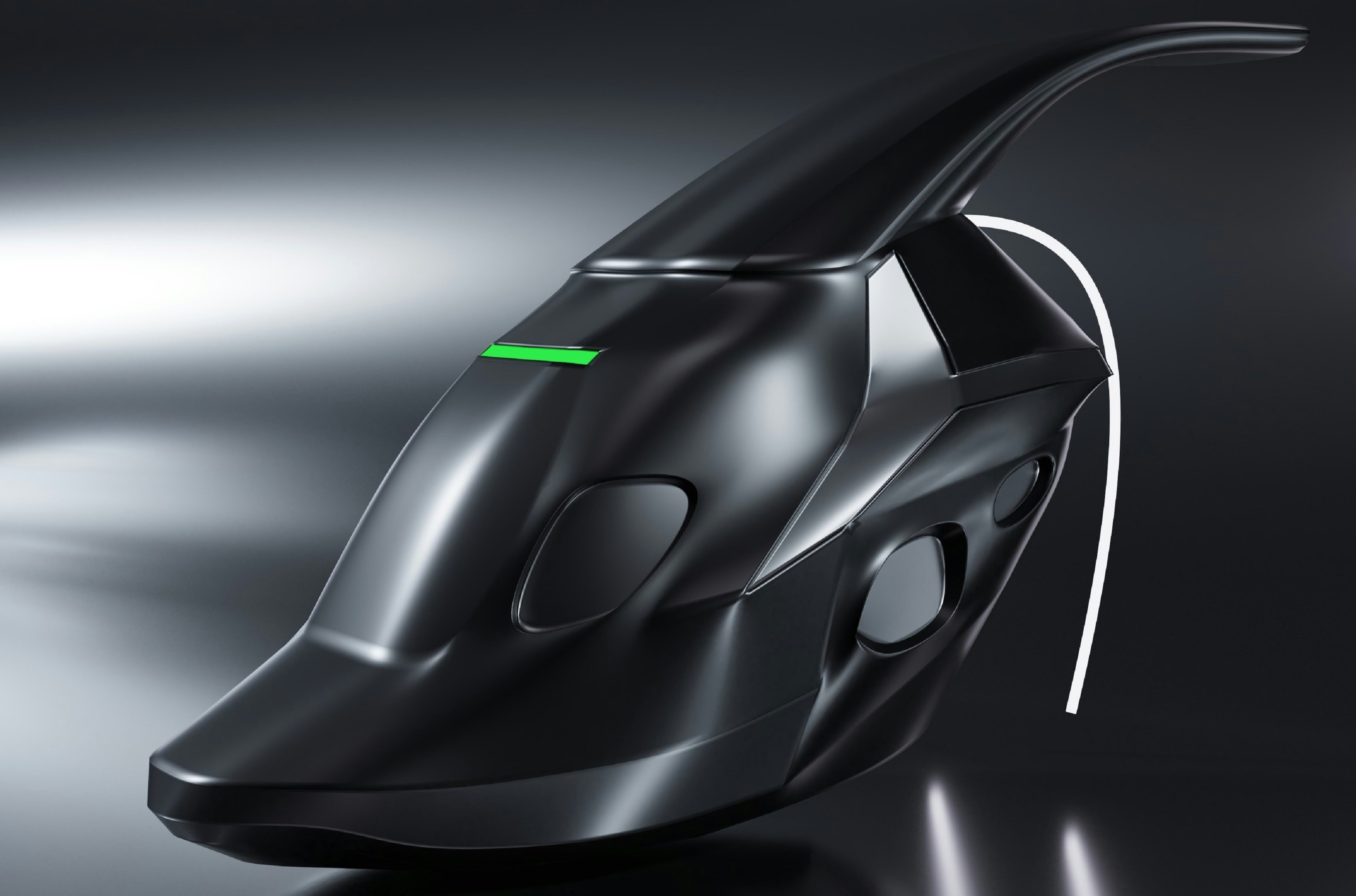 a futuristic car with a green light on it