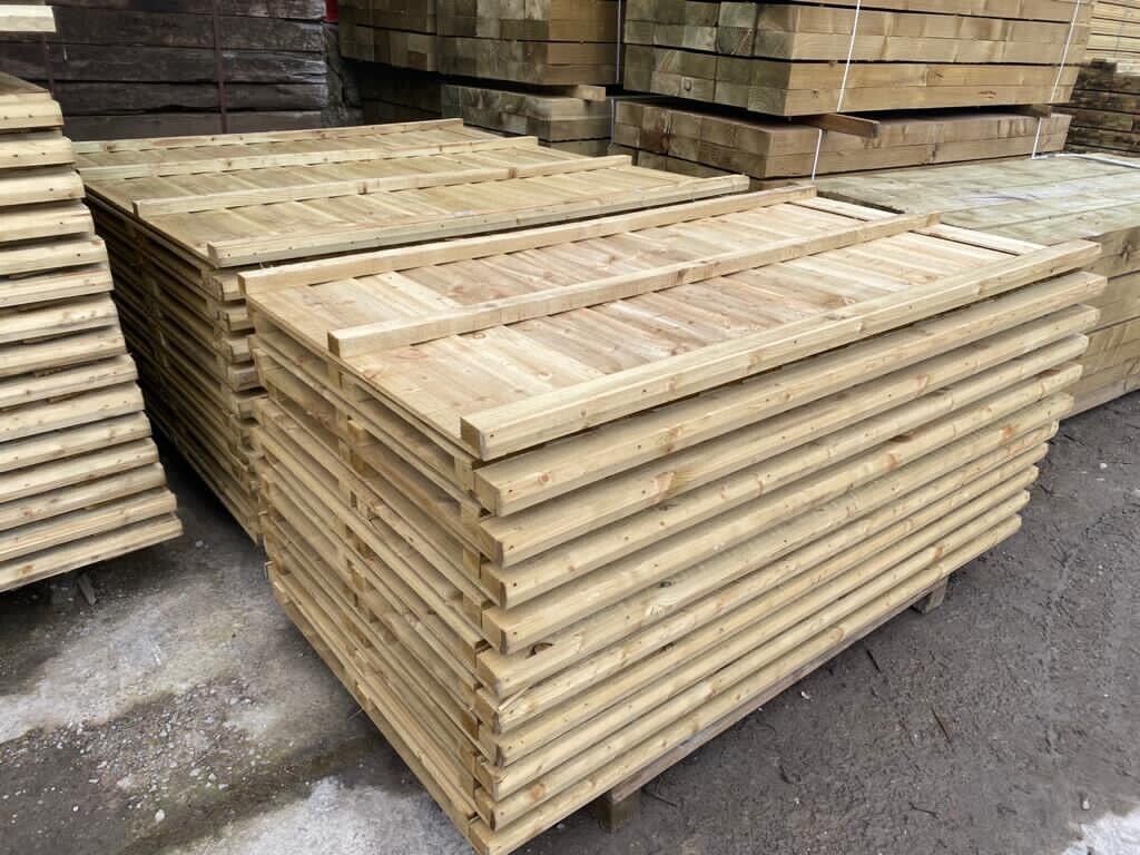 Group of men standing with Sufboard