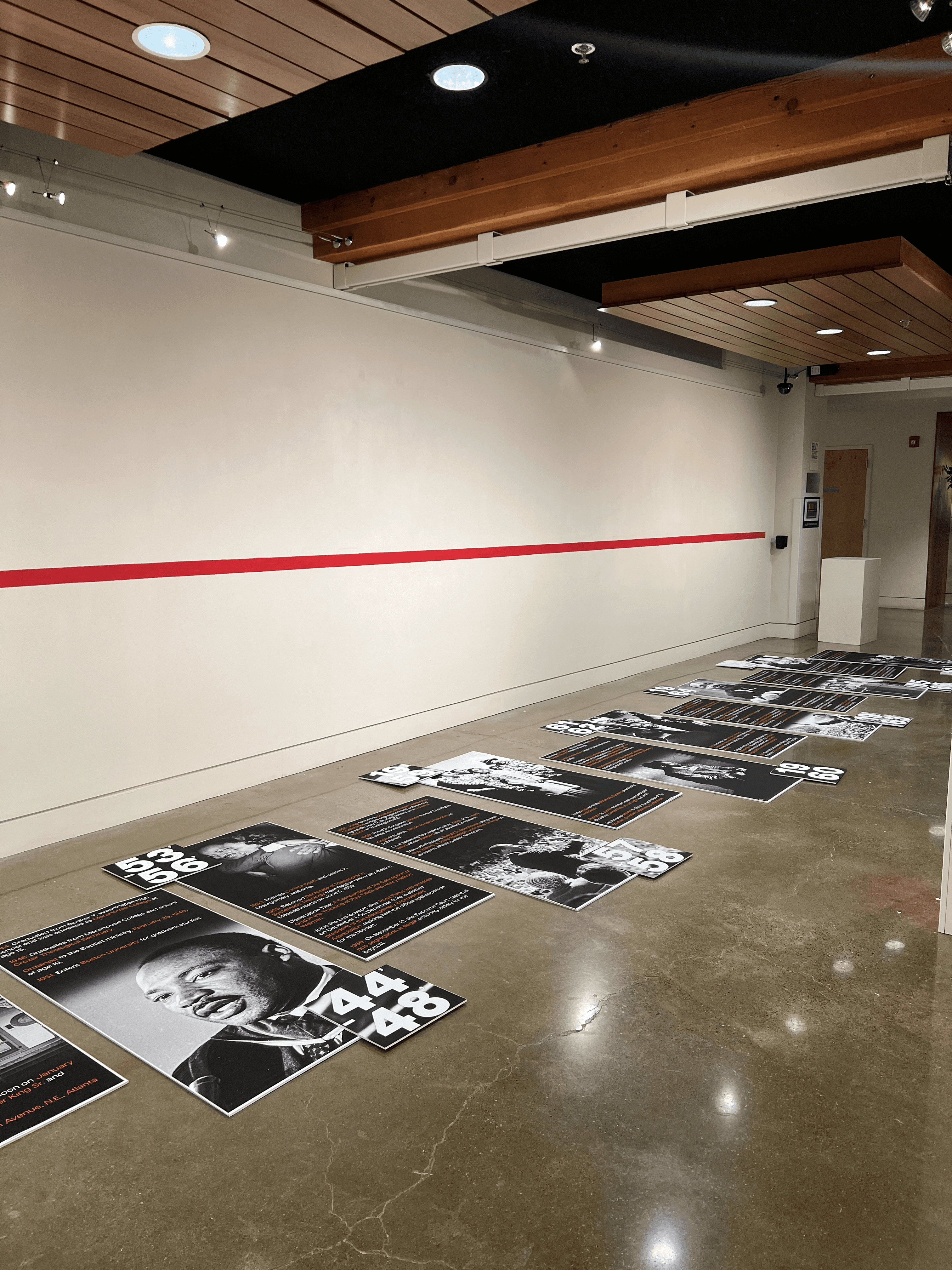White distressed smiley face logo (X eyes, tongue out) centred on a solid black background, showing rough, hand-painted edges.