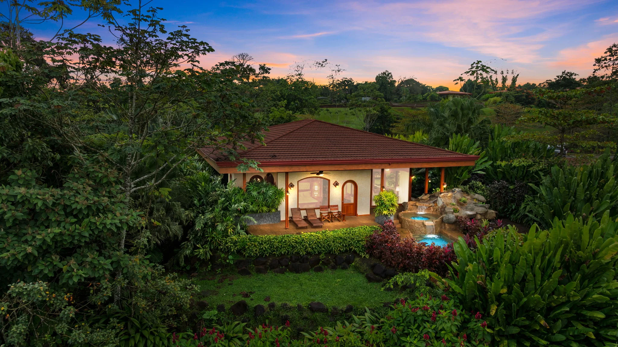Villa Ramírez at Arenal Hills with the sun setting