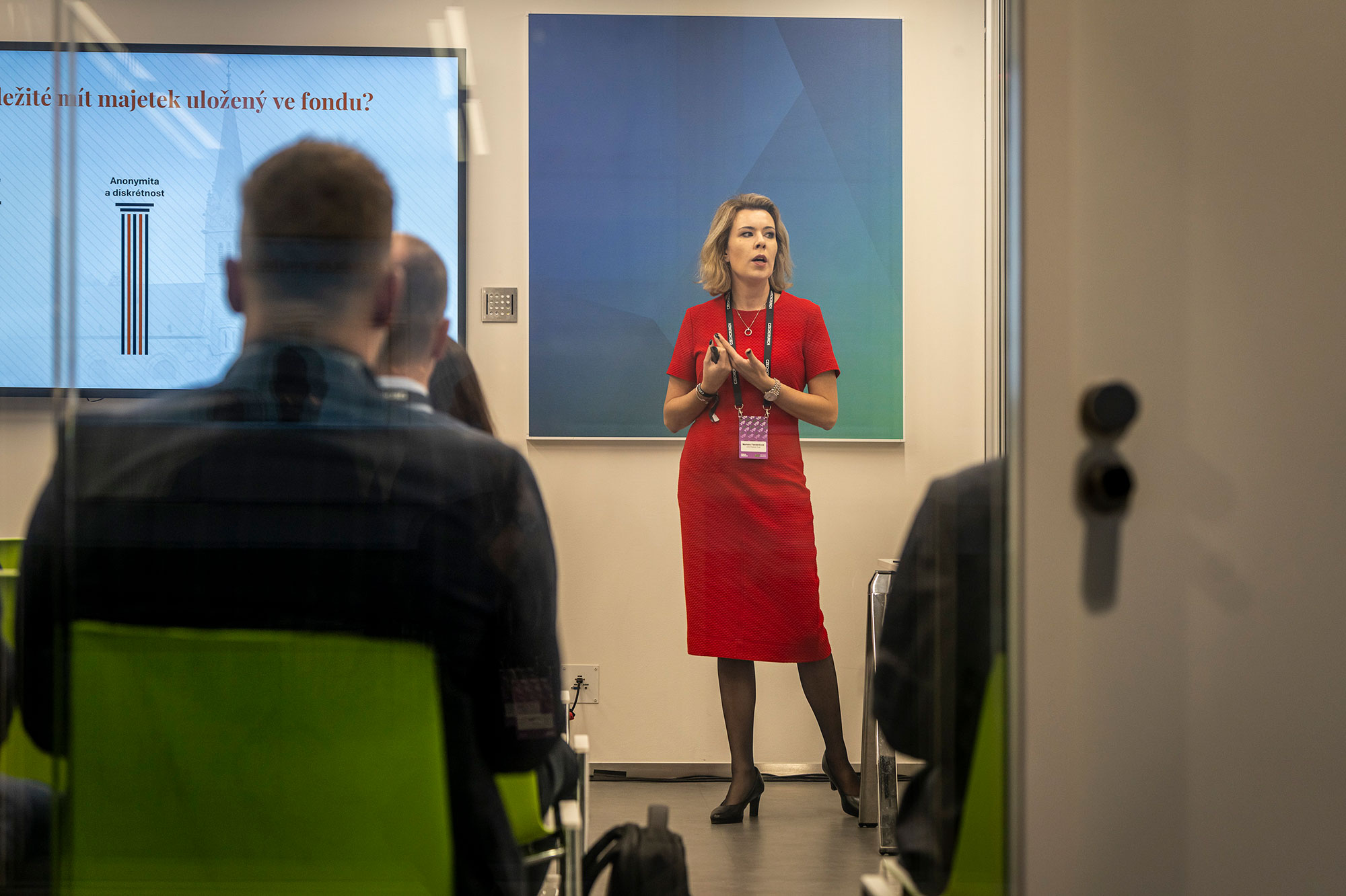 Female speaker presenting at breakout session during Money Maker conference by CzechCrunch in Prague