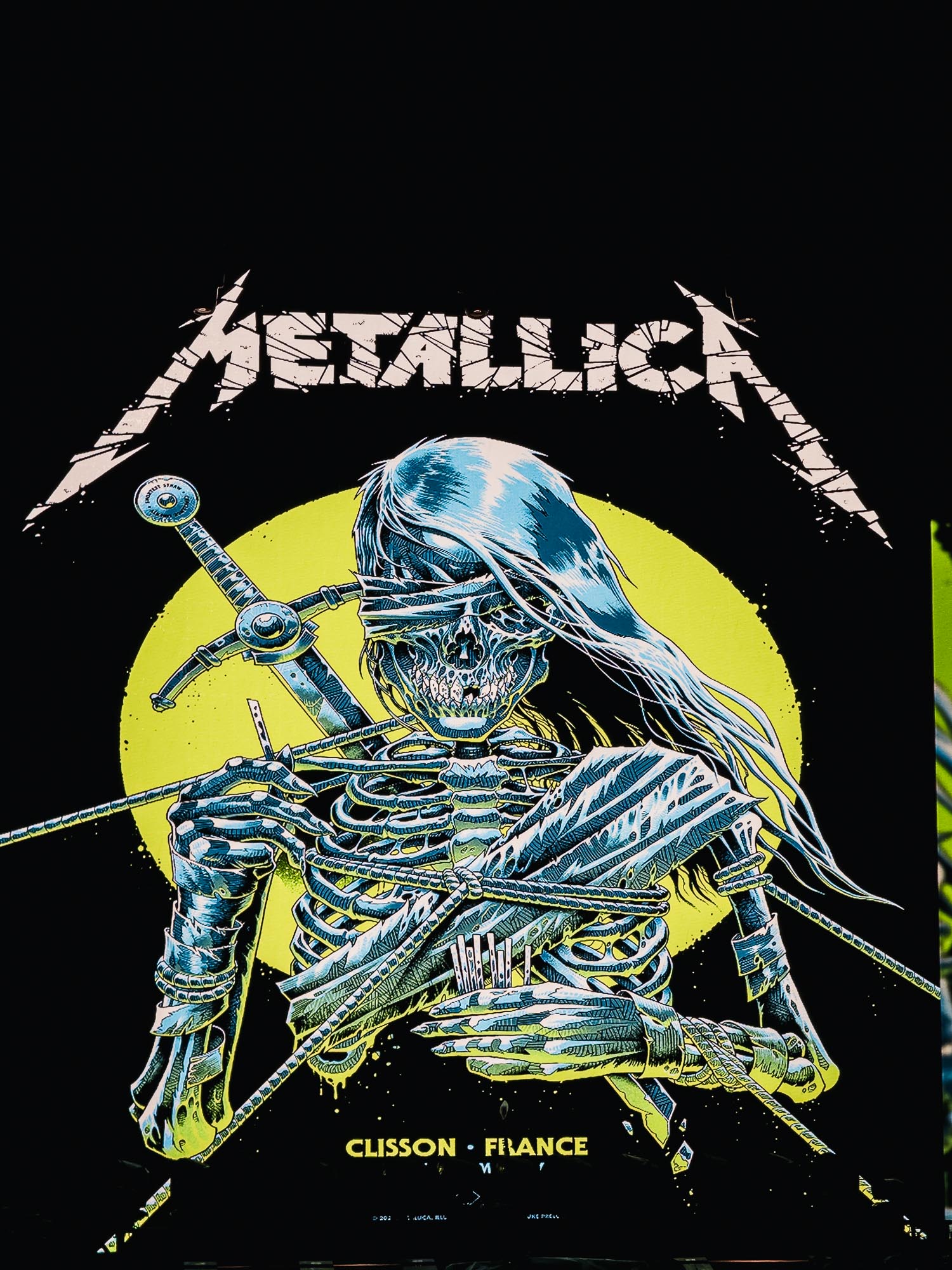 Affiche illustrée façon comics pour le concert de Metallica à Clisson, squelette et épées