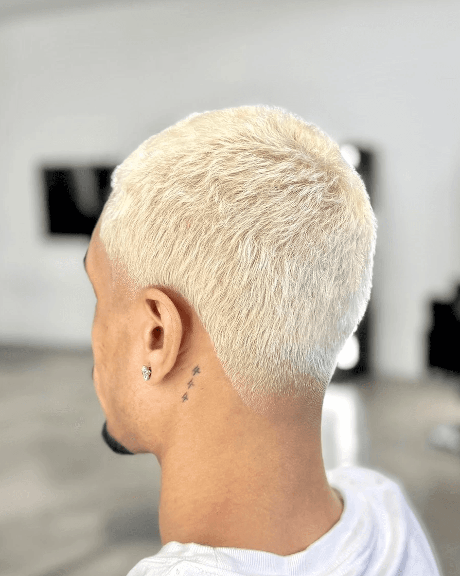 Low taper fade haircut featuring short textured finish by Courtney Palmore, perfect for low maintenance men’s styling. The Rich Barber Hair Studio West Hollywood, California. Los Angeles