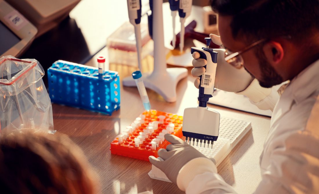 Dentist in a lab doing microbial sequencing