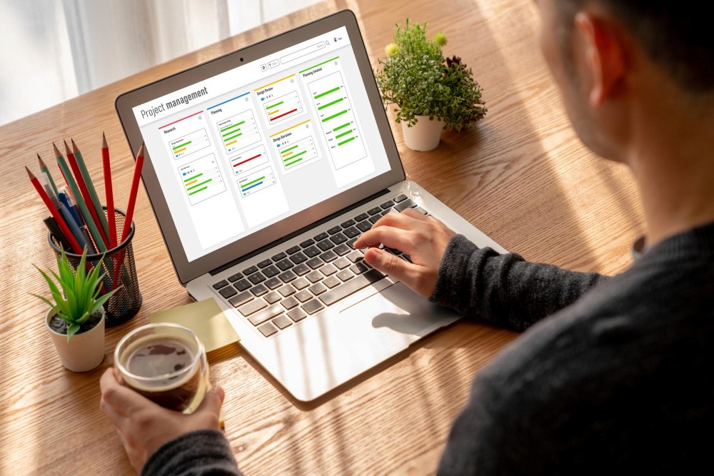 Team members in an office setting having a discussion, representing clear communication throughout the project process.