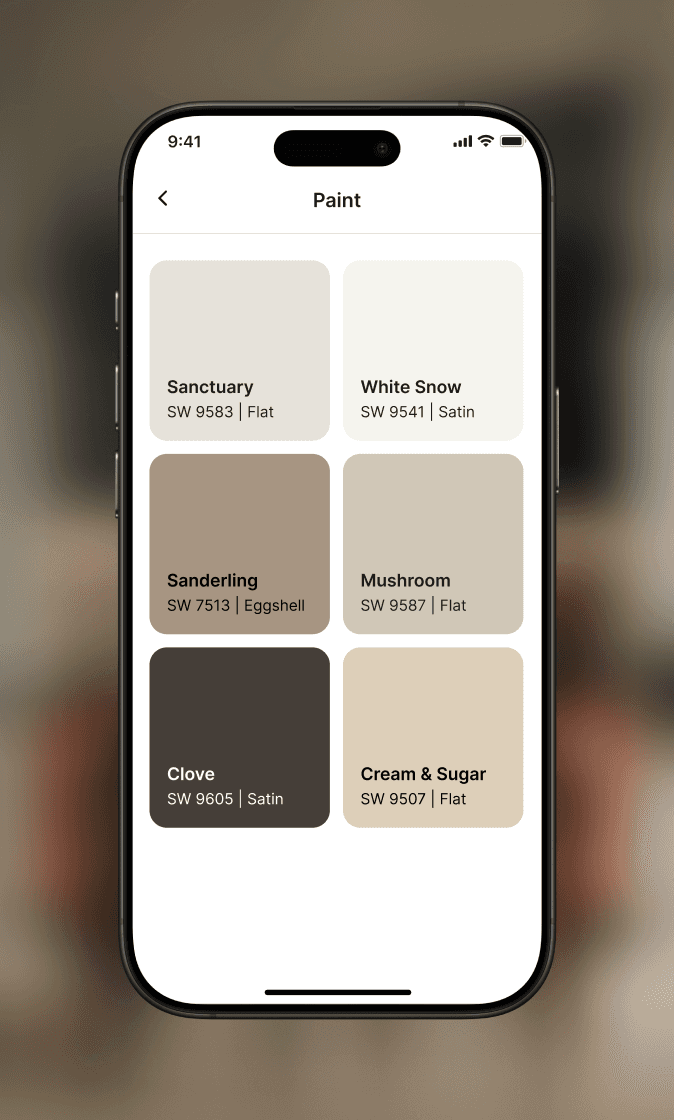 man in grey crew-neck t-shirt smiling to woman on counter