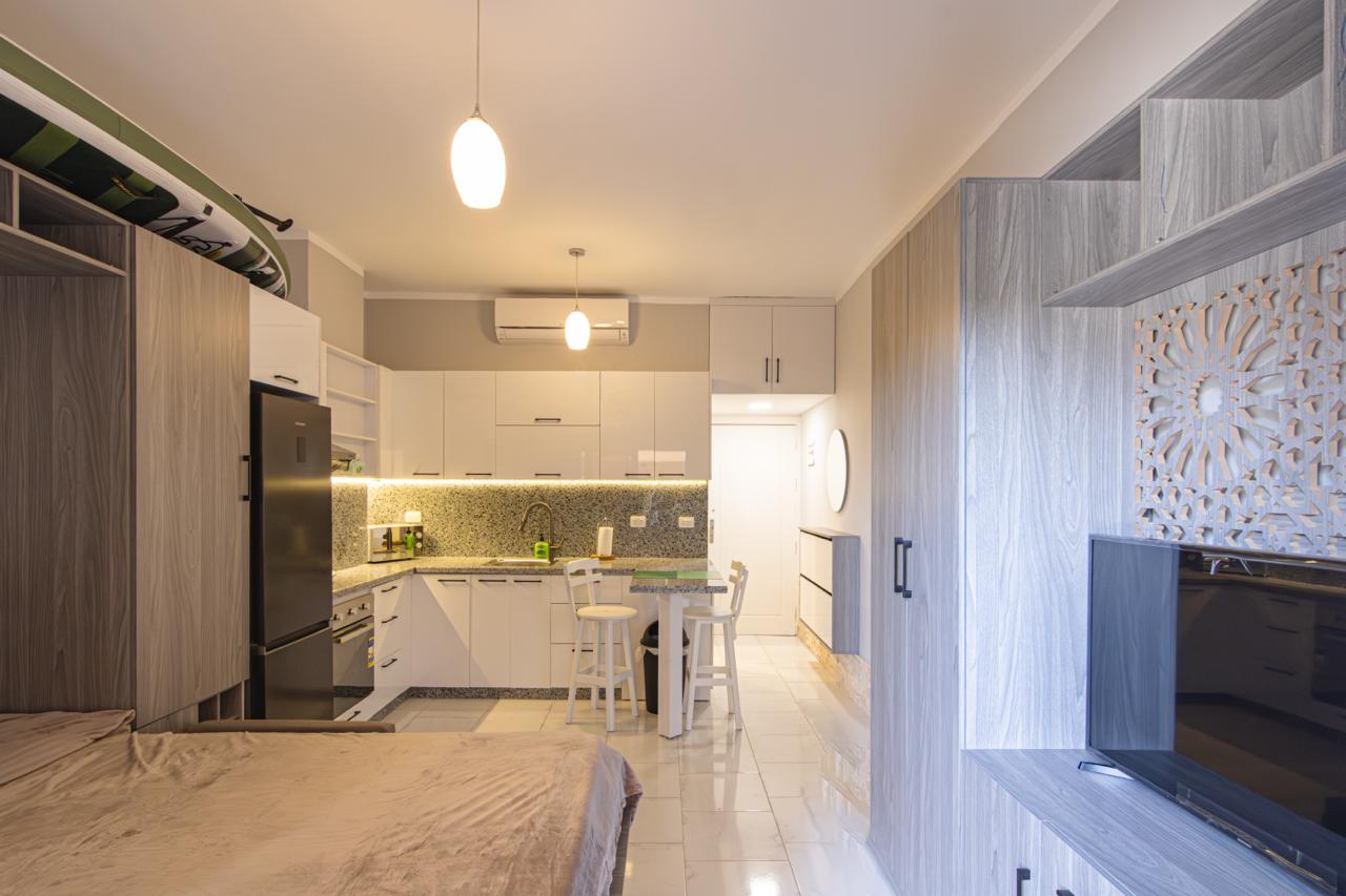 white and brown concrete building under blue sky during daytime