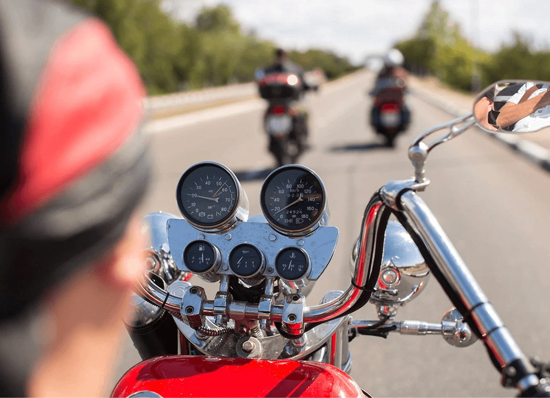 Motorcyclist riding on a highway, illustrating common causes of motorcycle accidents in Stockton