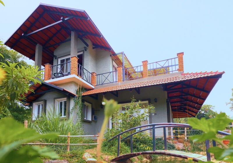 A flower-filled ring floats in fluffy clouds.