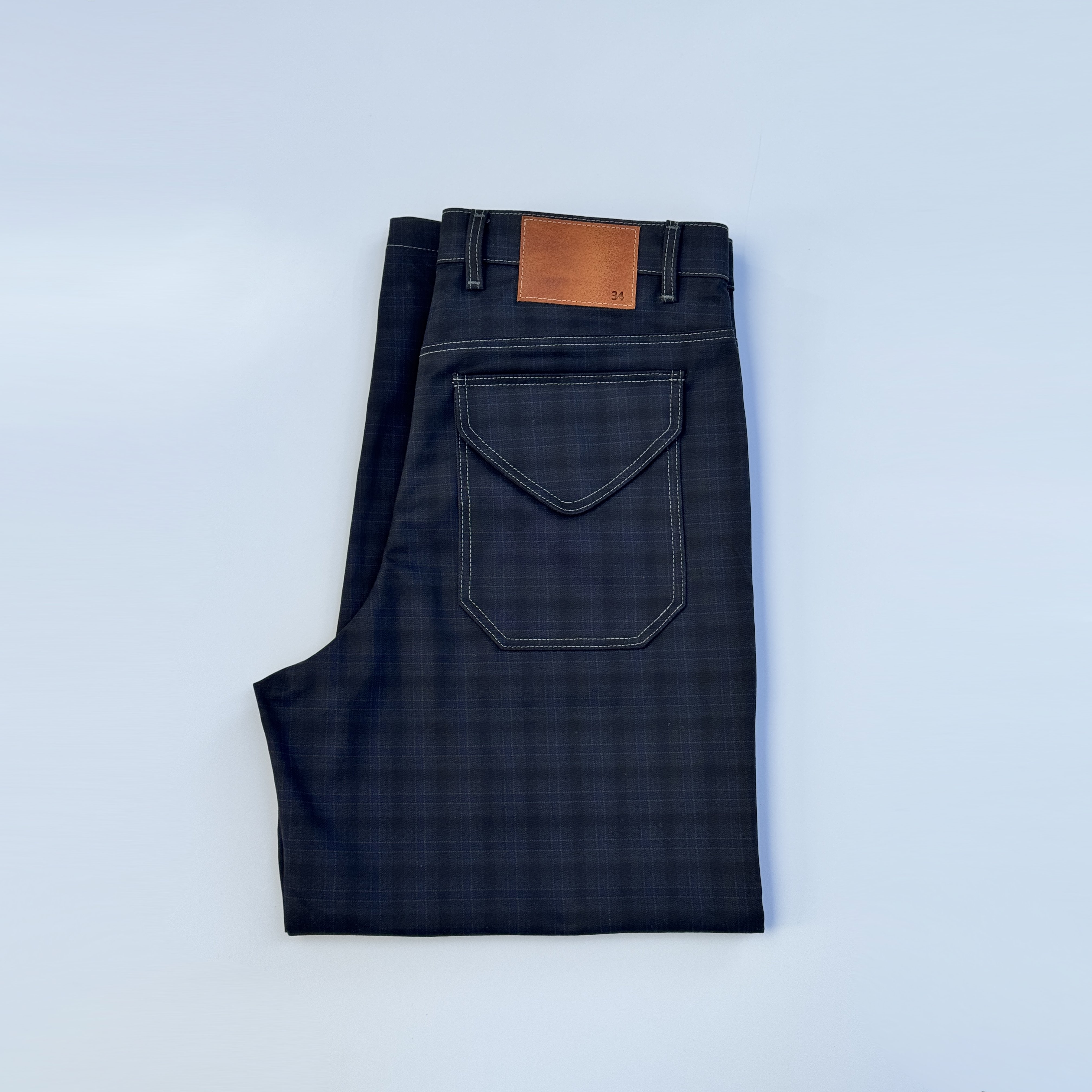 Printed denim trousers with magnetic closure