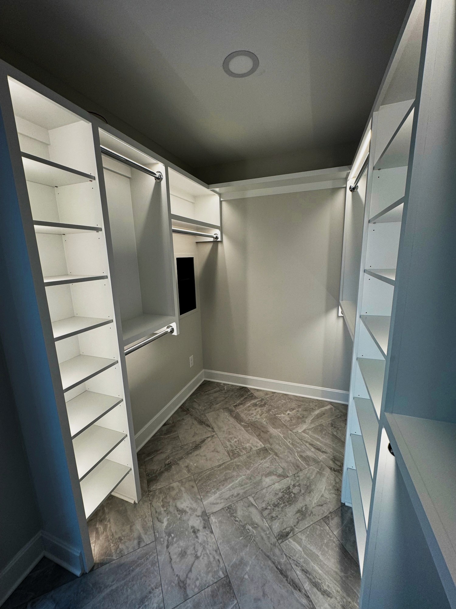 Tile floor closet lit dim