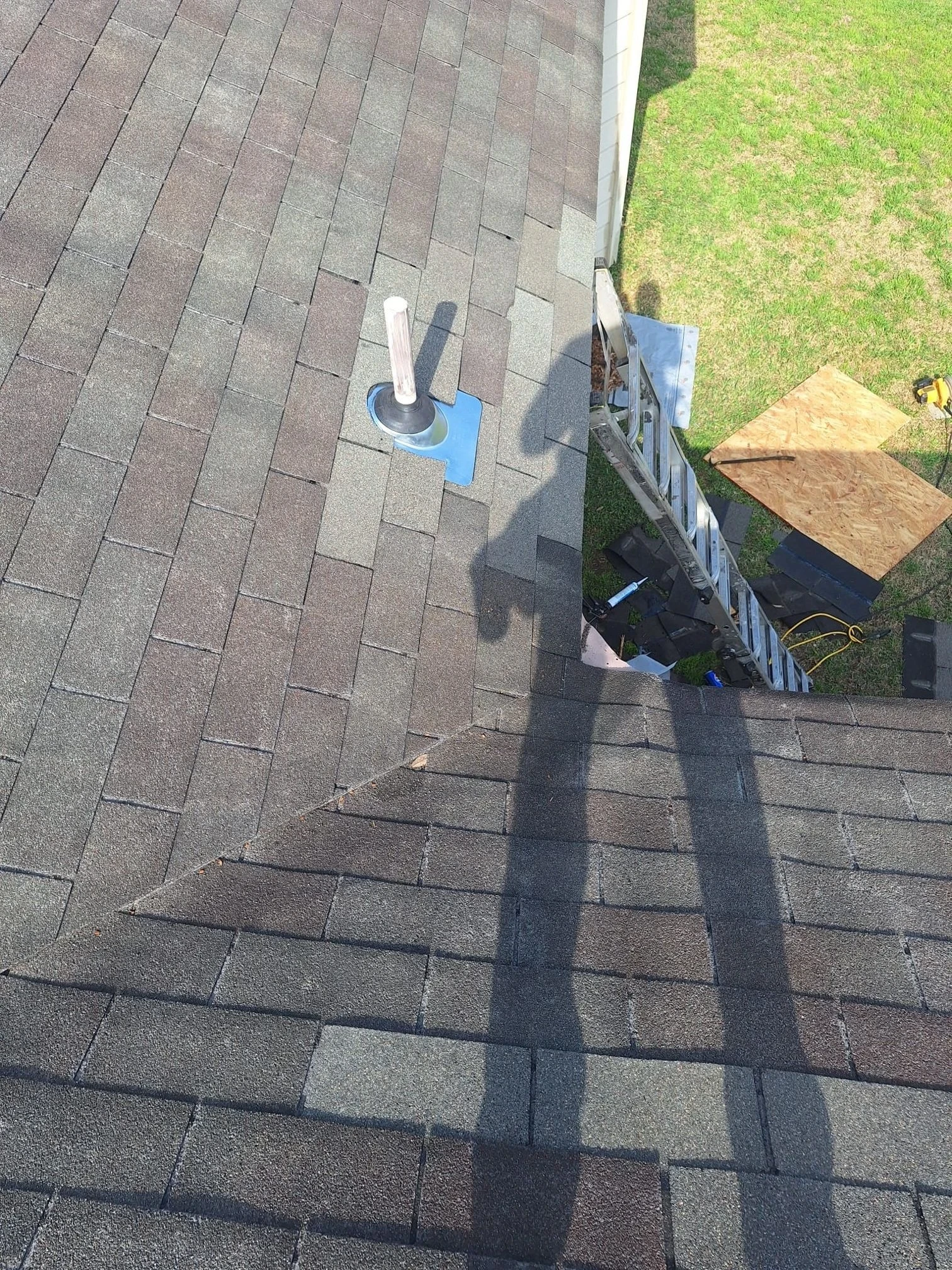 Finished repair: leaking pipe area and shingle repair in New Braunfels, Texas.