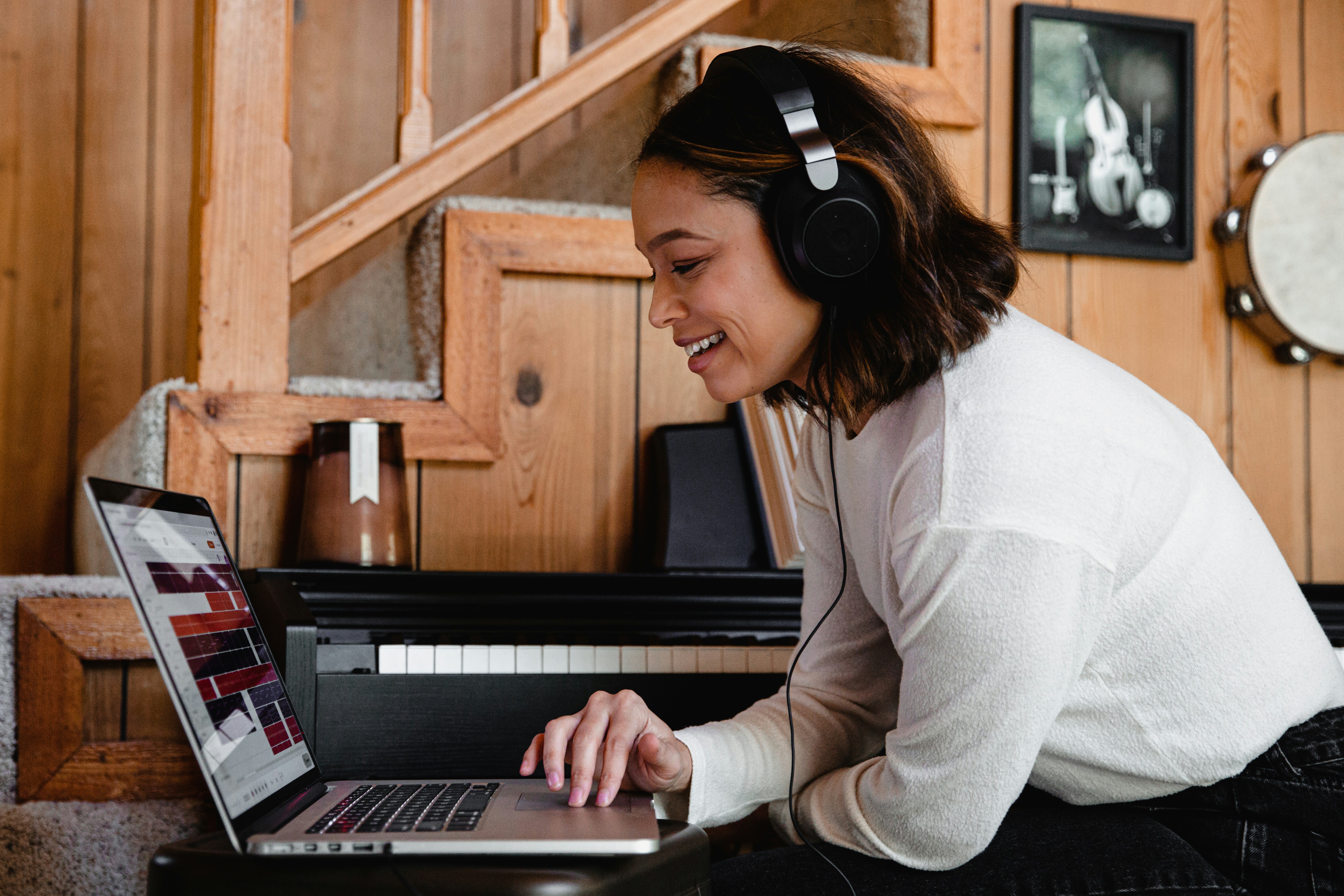 Woman enjoying with headphones on - female voice types