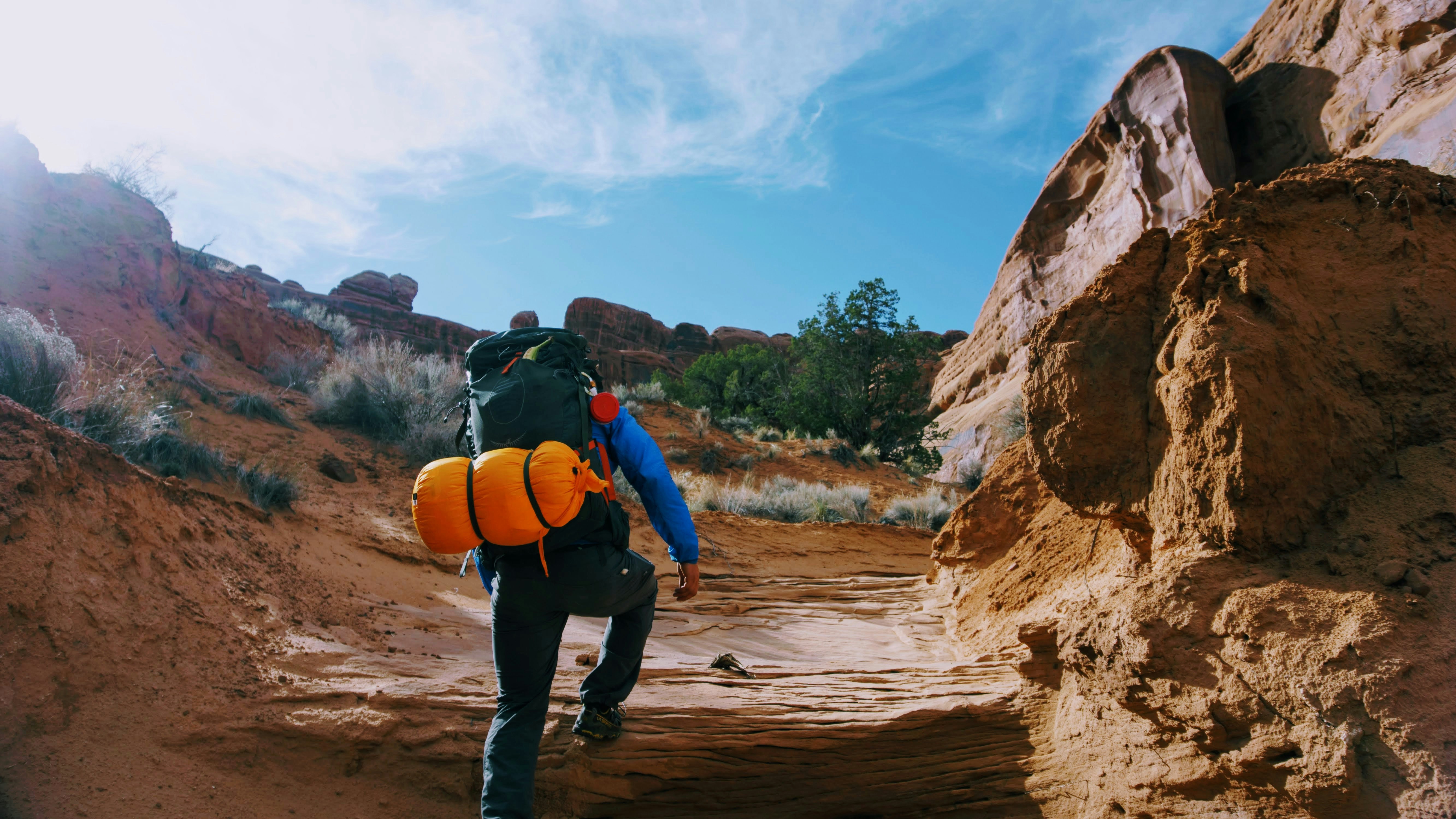 man going on a trek - Fall hiking outfit