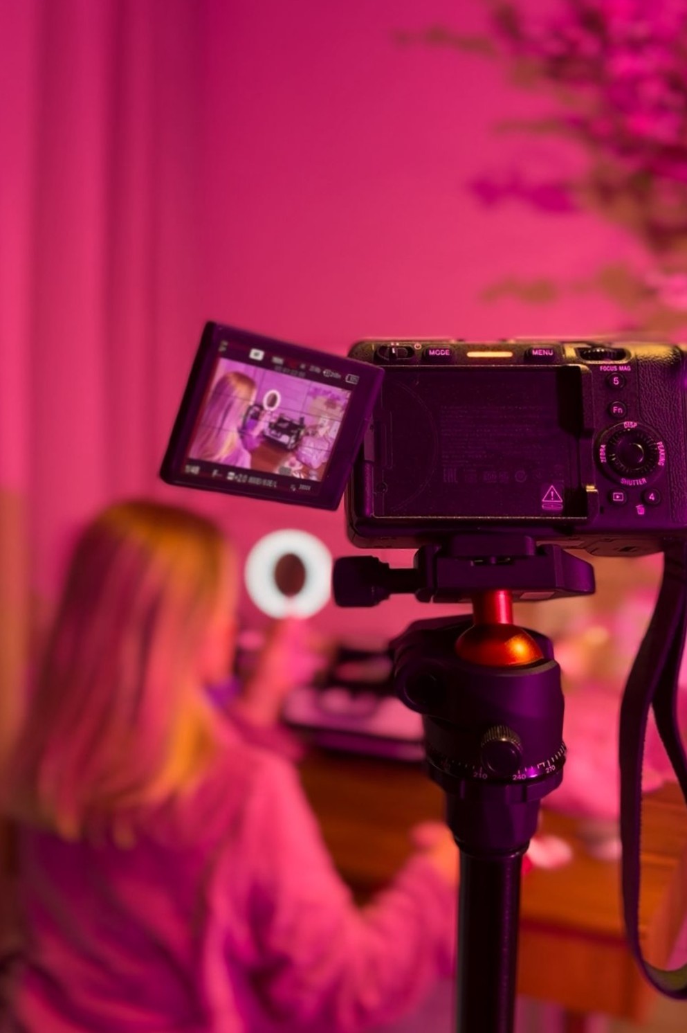 Woman drinking a dark beer in a brewery