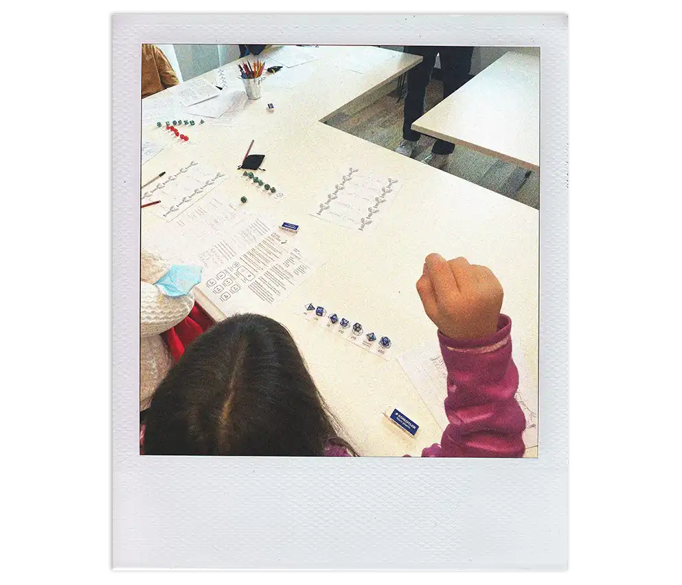 Student engaged in a Dungeons & Dragons literacy session at Spellbonding Adventures