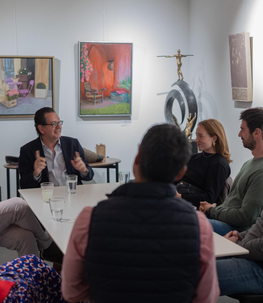 A bright yoga studio with a girl practicing gentle restorative yoga.